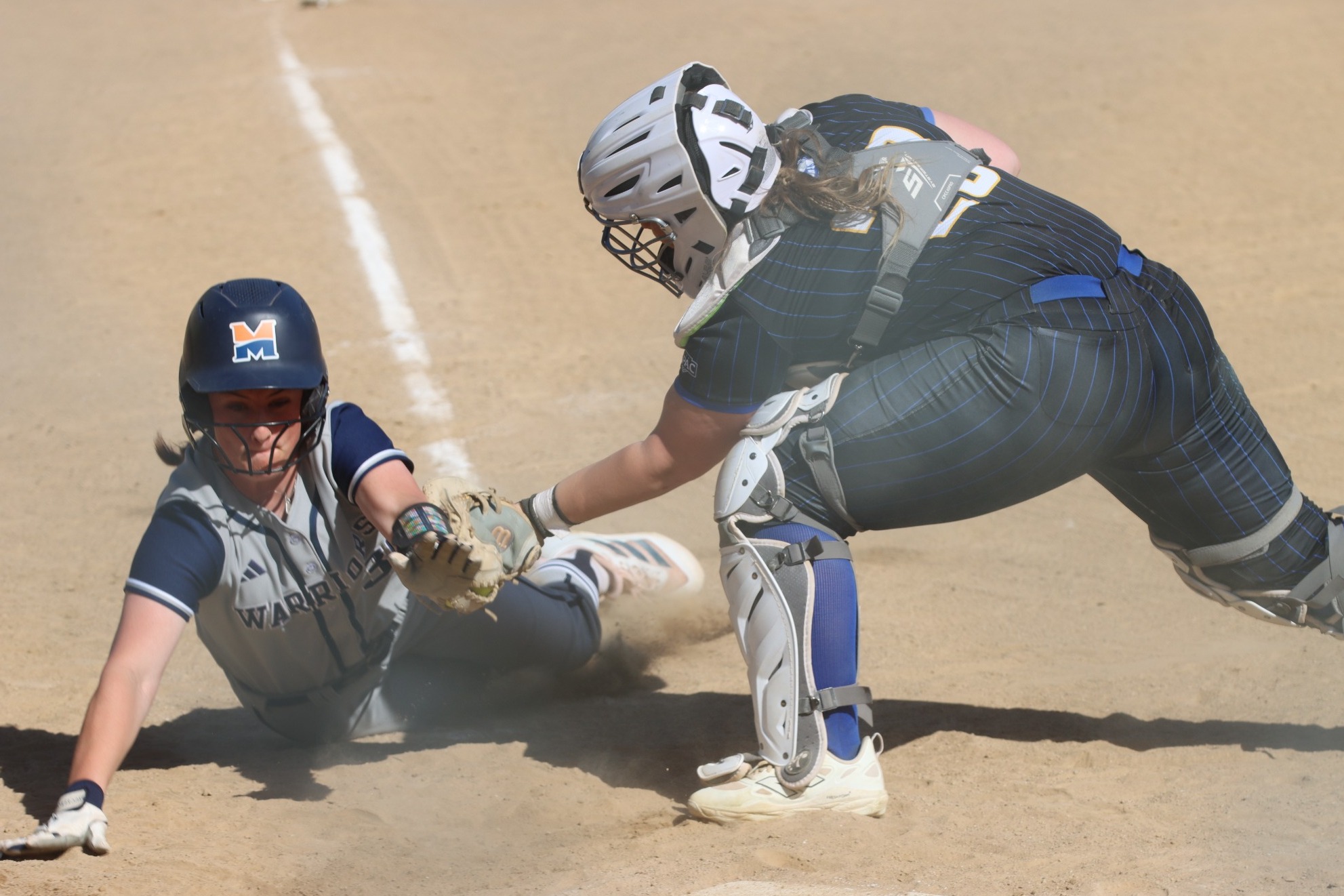 Rylee Cain tagging runner out