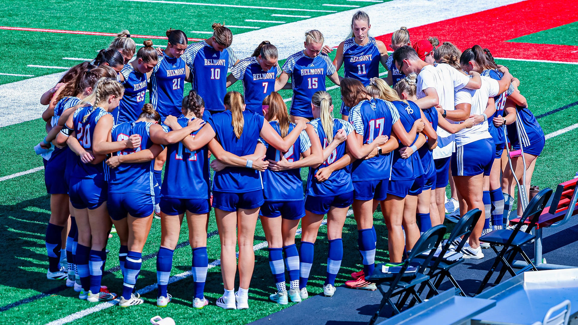 women's soccer team huddle