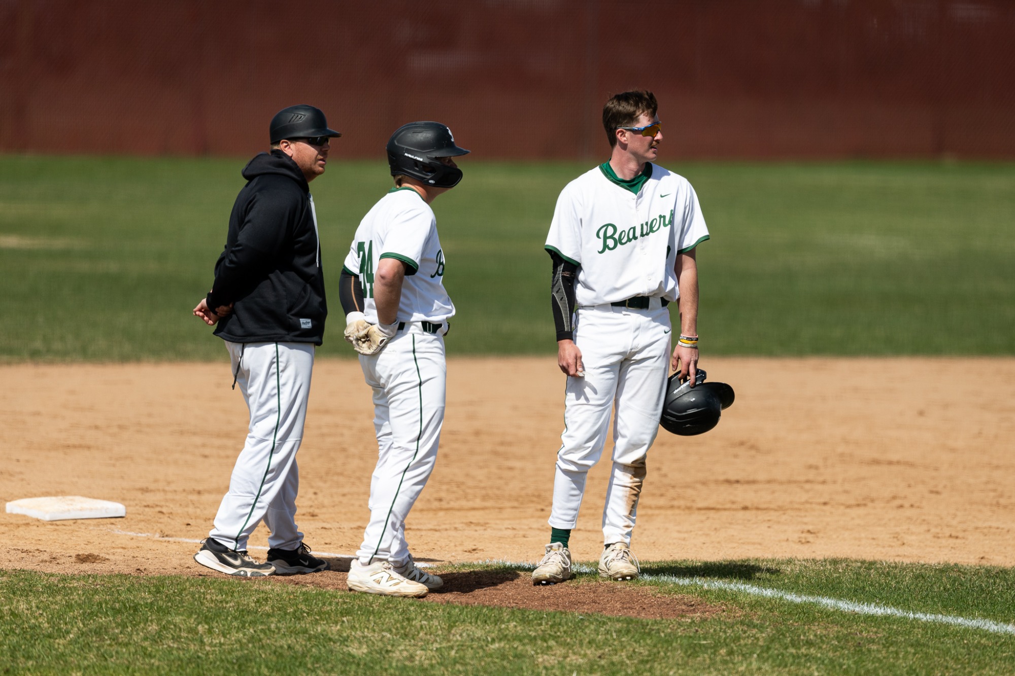 Matt Ellinghuysen, Ben Corradi (34), Hunter Hyden (32) - Baseball - Bemidji State Beavers vs. St. Cloud Huskies - BSU Baseball Field - Bemidji, MN - Friday, May 2, 2025 | Brent Cizek