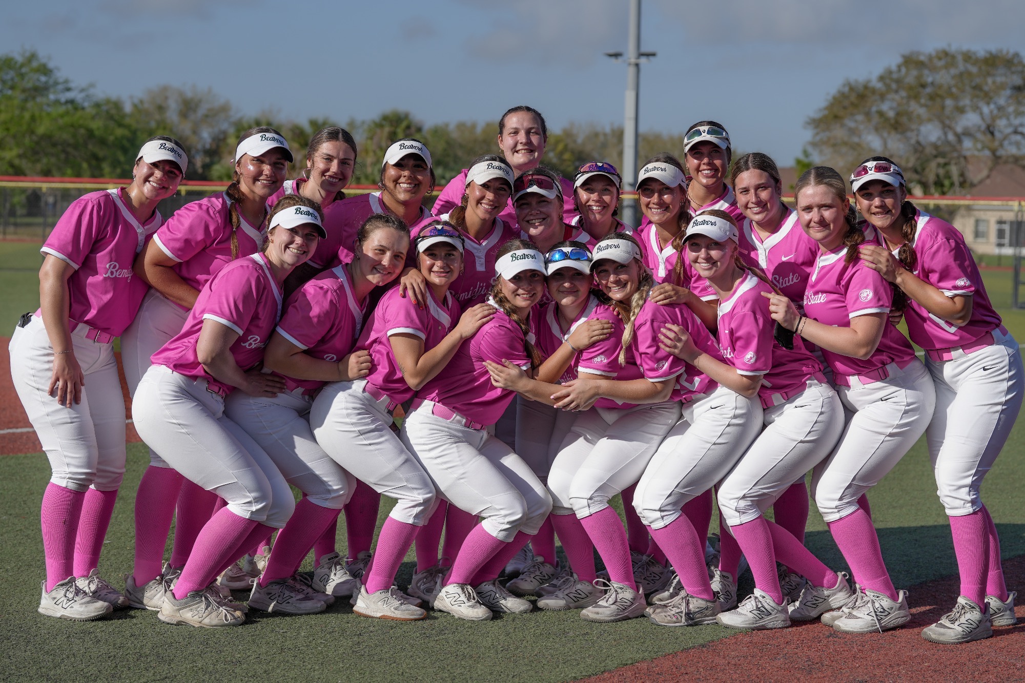 Softball Team in Pink Uniforms