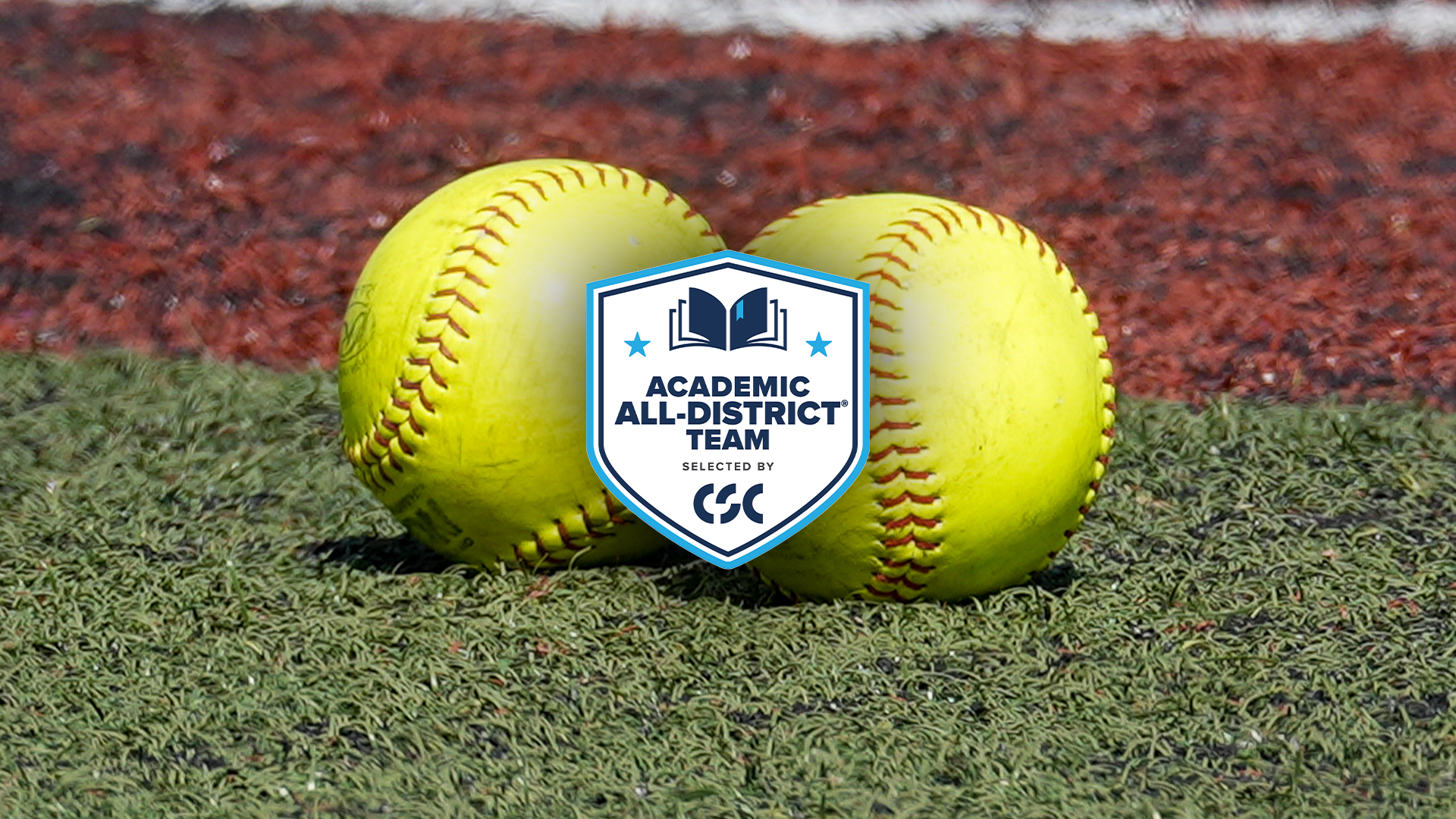 Photo shows two softballs sitting on the ground next to each other. Overlayed on the softballs is the College Sports Communicators Academic All-District logo. The logo is blue and white primarily, and includes the CSC logo. 