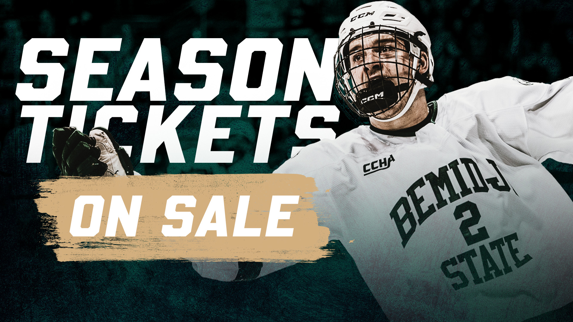 Promotional graphic for Bemidji State hockey season tickets. A hockey player in a white Bemidji State jersey with the number 2 raises a hockey stick overhead on an ice rink. Large white text reads “SEASON TICKETS,” and a tan banner at the bottom reads “ON SALE.”