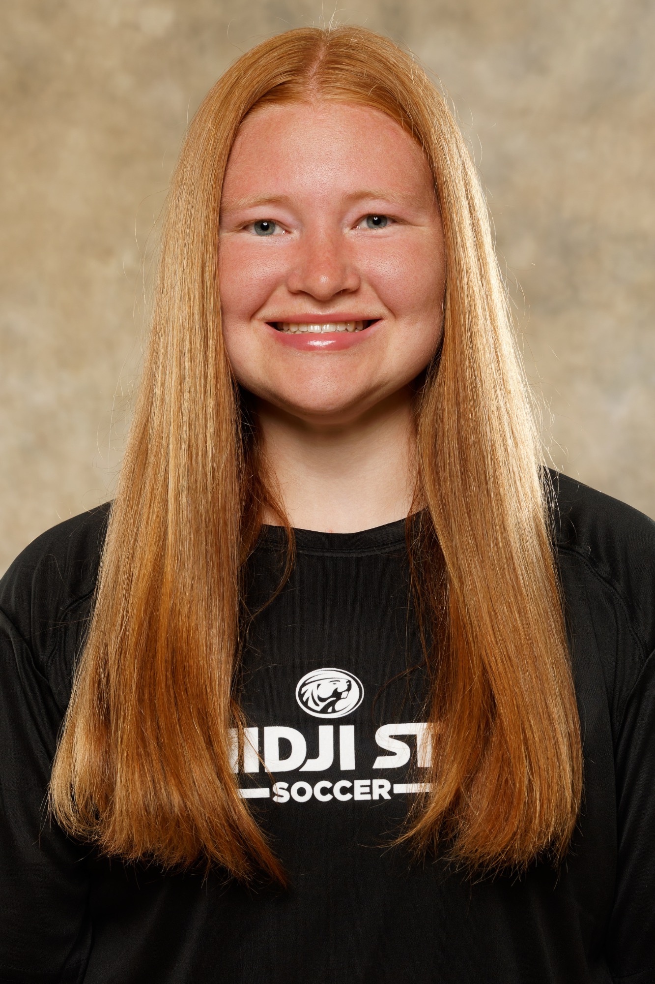 Portrait of Bemidji State soccer manager, Elizabeth Banes, in black team training shirt