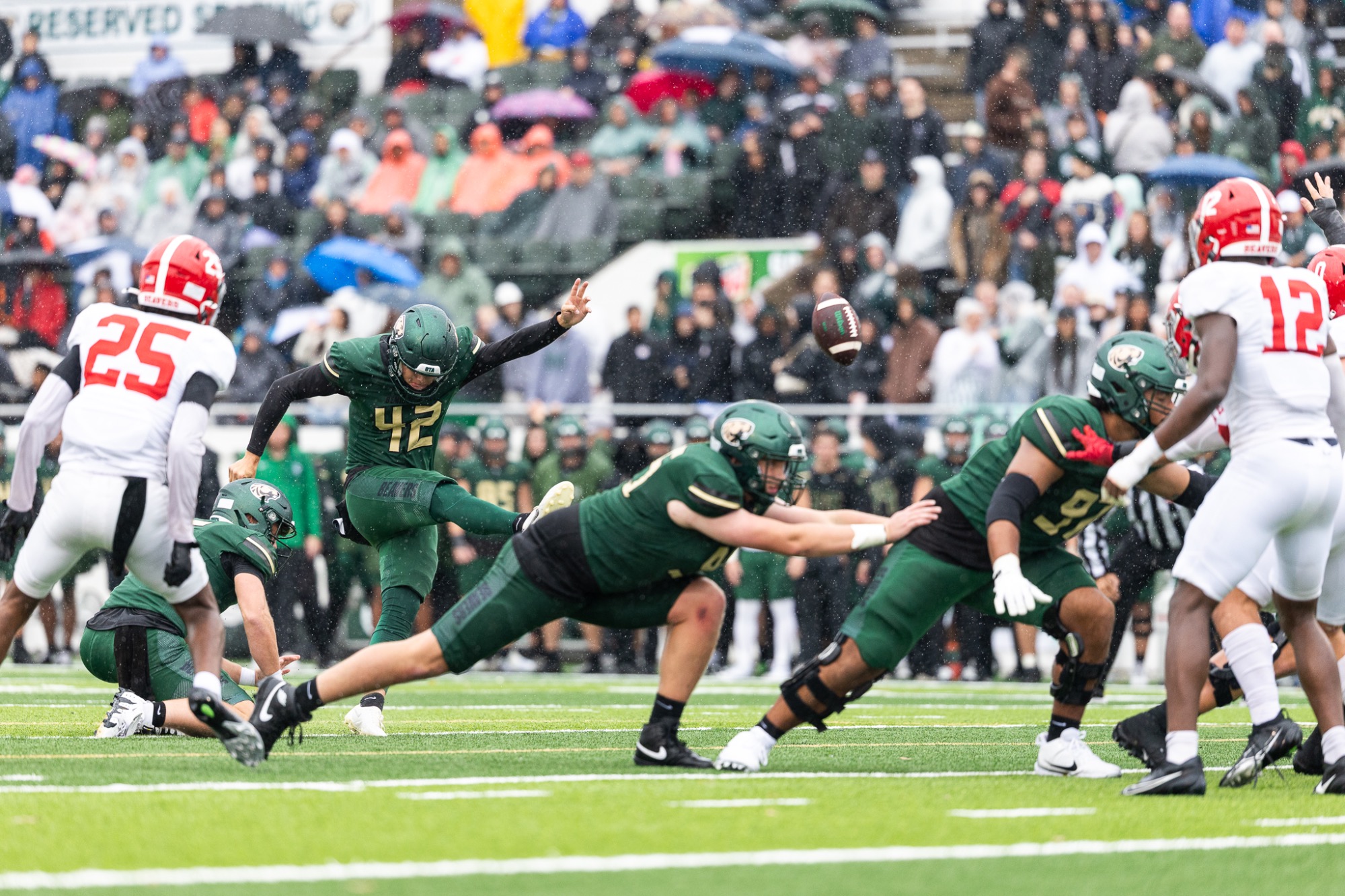 Kyle Nadler kicks the ball during a punt against Minot State University.