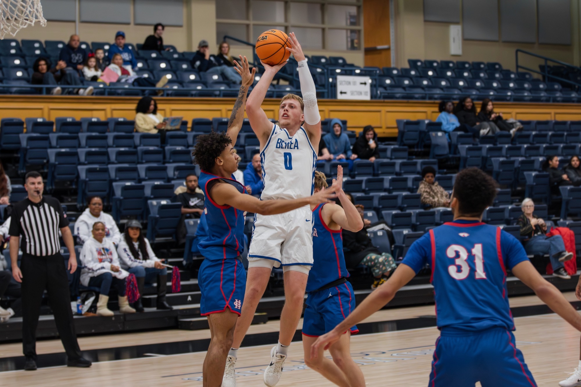 Andrew Jones Shoots over defenders for a bucket