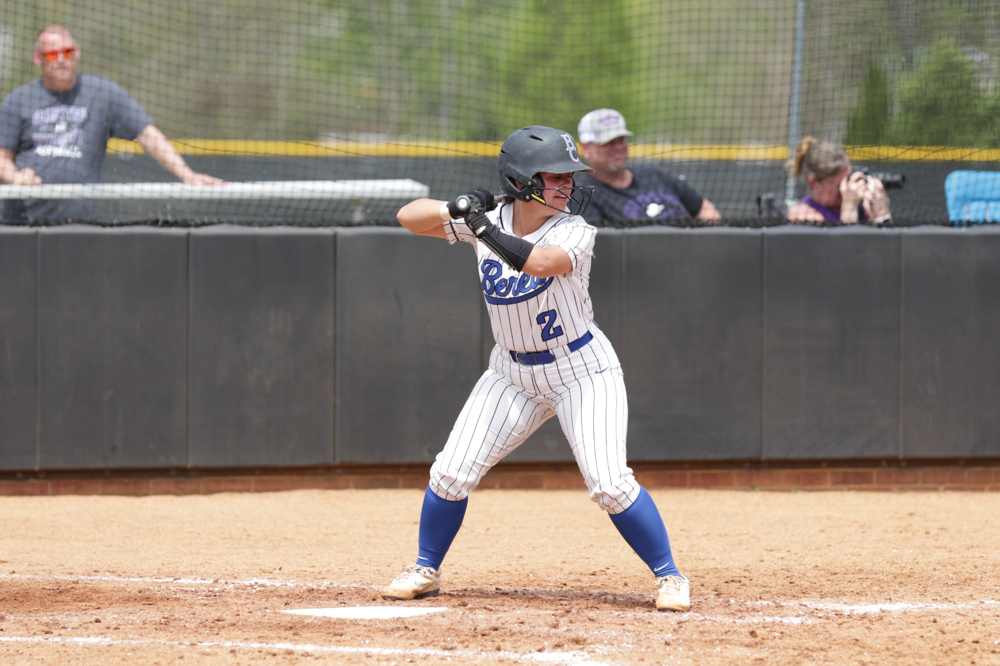 2 - Josie Hollingsworth - hugging a family member on the field during a ceremony