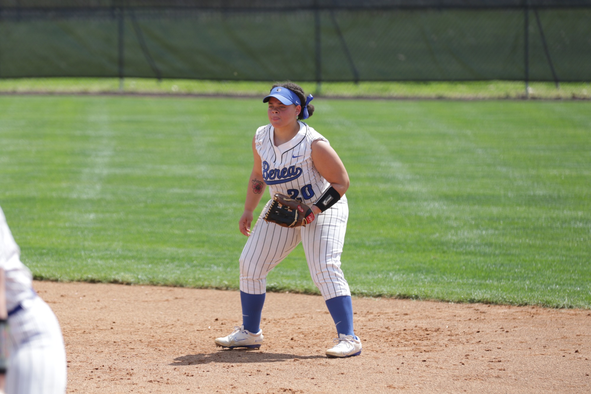 20 - Kyla Simons - standing in the infield ready to field a play