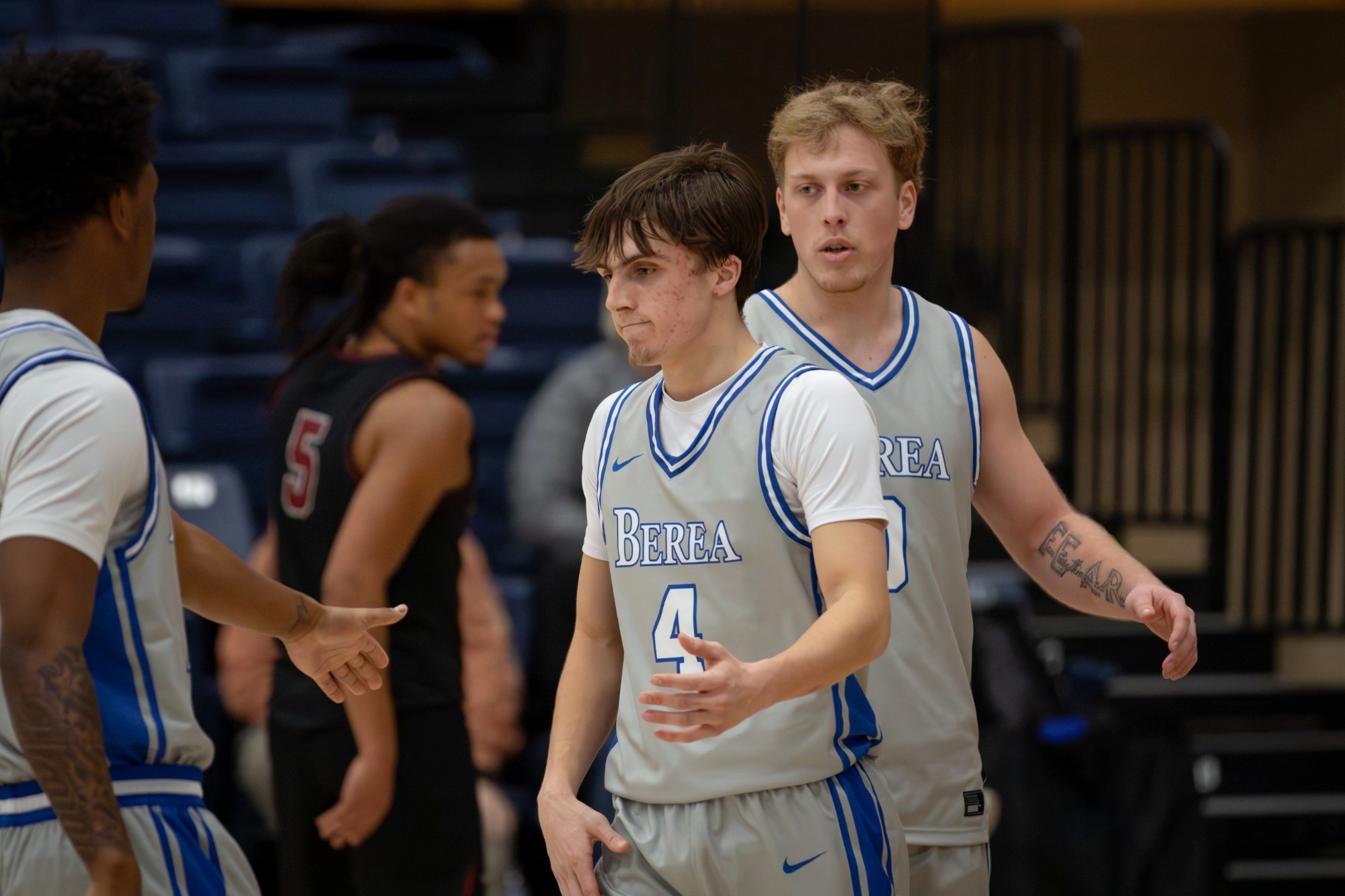 Zach fives a teamate 