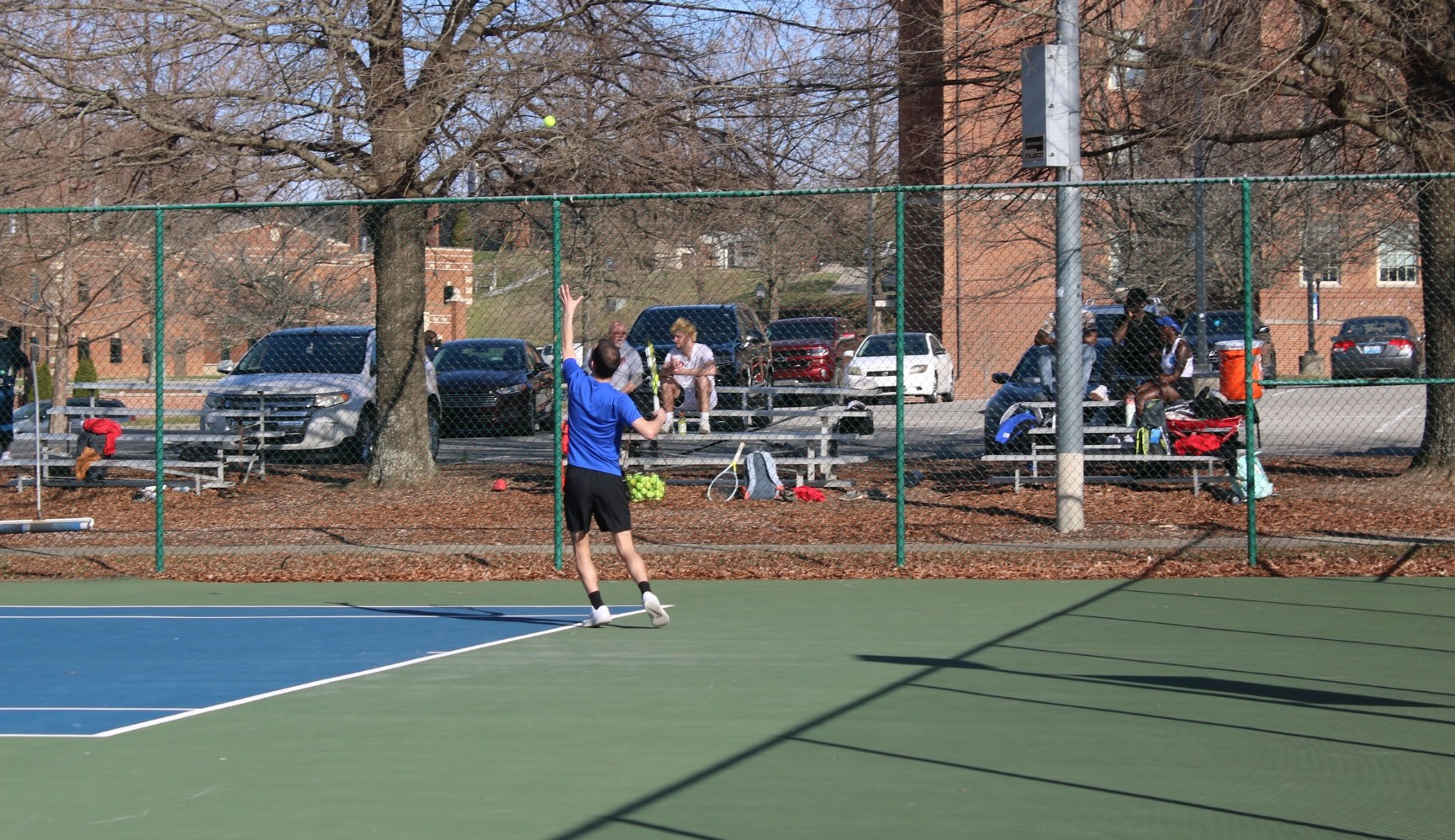 Bogdan hitting tennis ball
