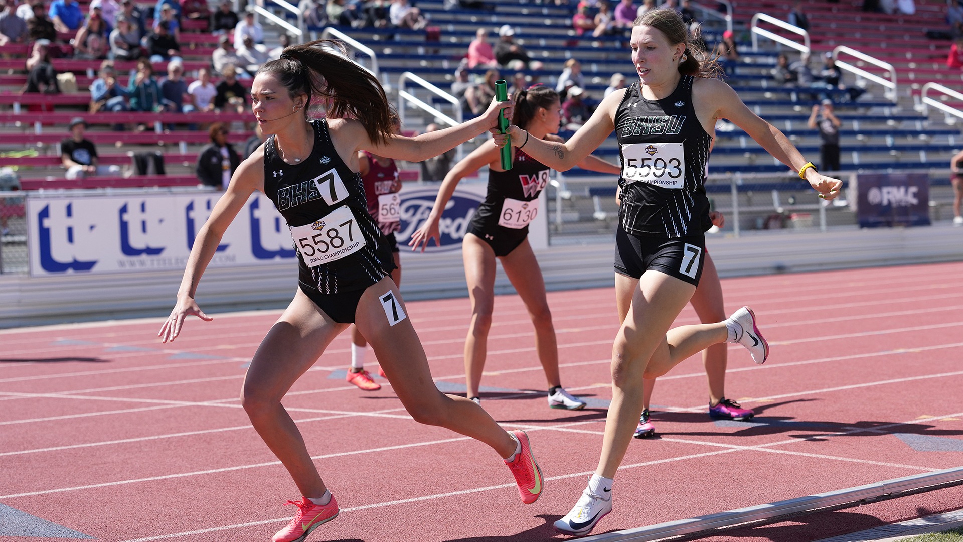 Avery Marler and Madyson Wolfe in the 4x400 Relay
