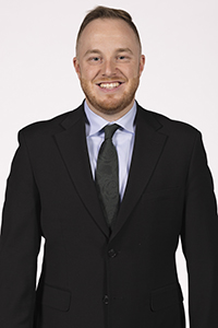 Binghamton University men's basketball marketing photo, photographed October 18, 2023 at the Events Center. Assistant coach Patrick Norris