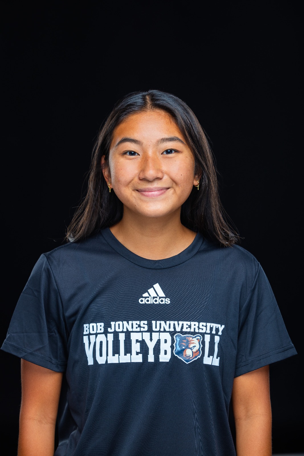 A member of the BJU Bruins roster poses for a headshot on a black background at Bob Jones University in Greenville, S.C., Monday, Aug. 18, 2025. (Photo by Derek Eckenroth)