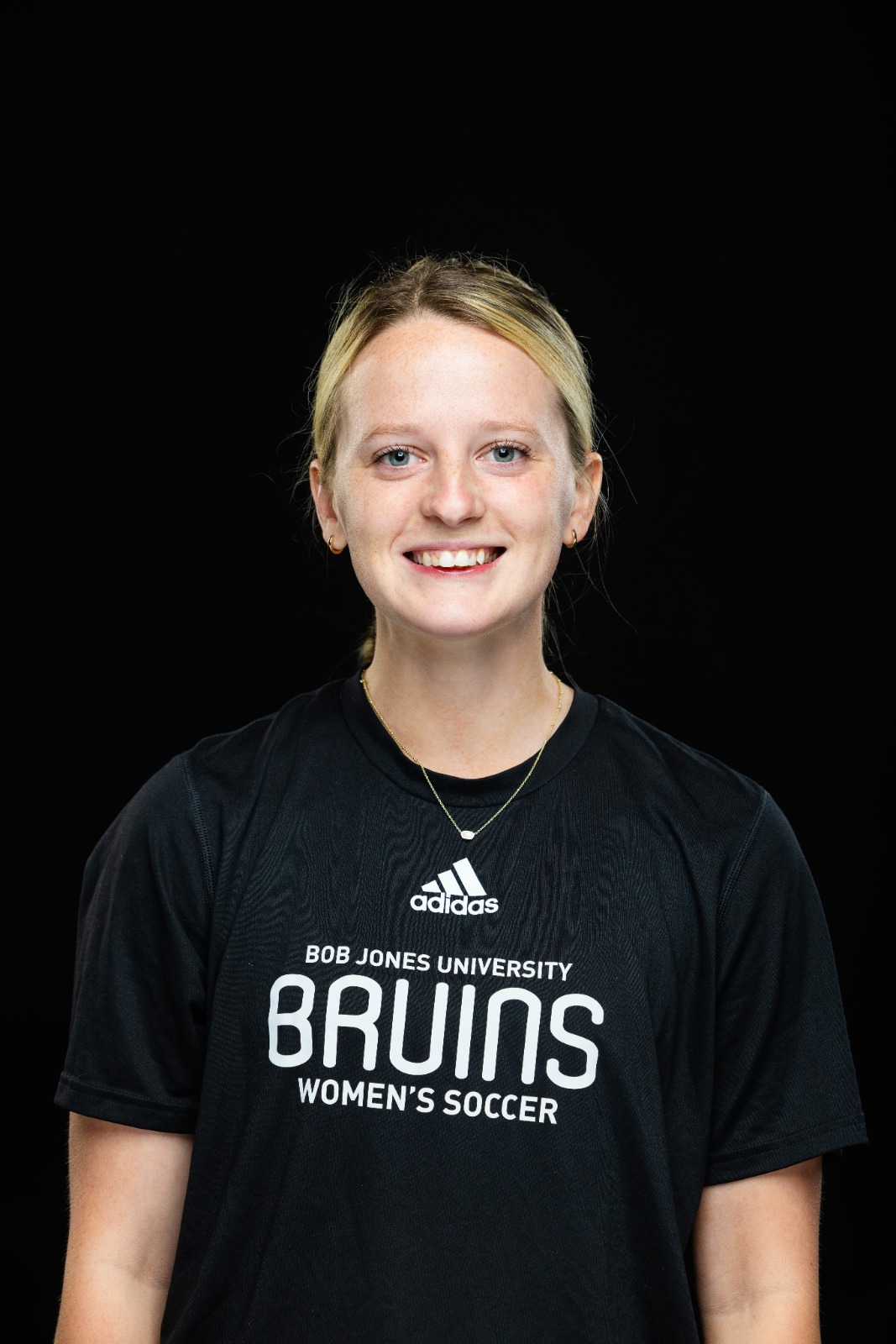 A member of the BJU Bruins roster poses for a headshot on a black background at Bob Jones University in Greenville, S.C., Monday, Aug. 18, 2025. (Photo by Derek Eckenroth)