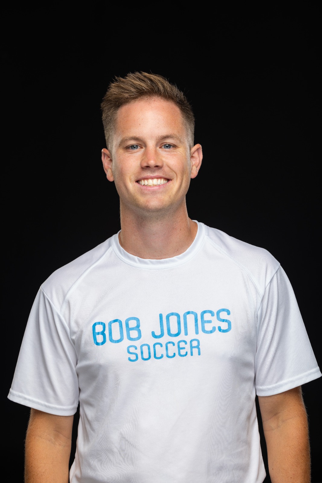 A member of the BJU Bruins roster poses for a headshot on a black background at Bob Jones University in Greenville, S.C., Monday, Aug. 18, 2025. (Photo by Derek Eckenroth)
