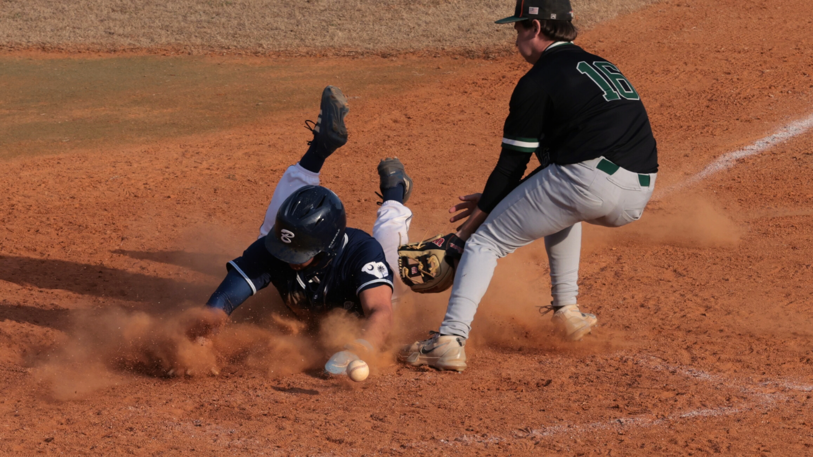Bob Jones baseball player sliding into home plate