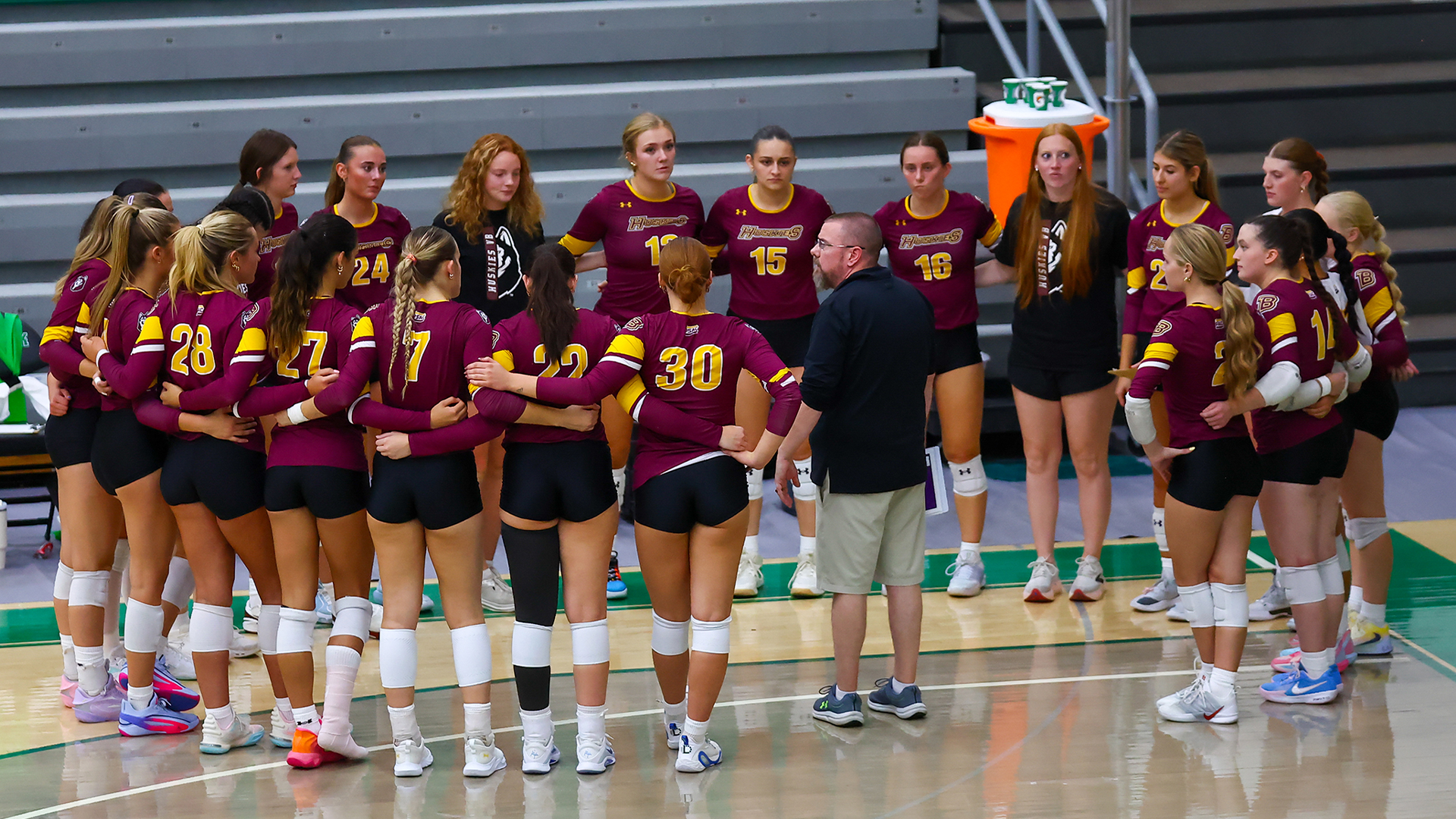 Slippery-Rock-Invite-Team-Huddle