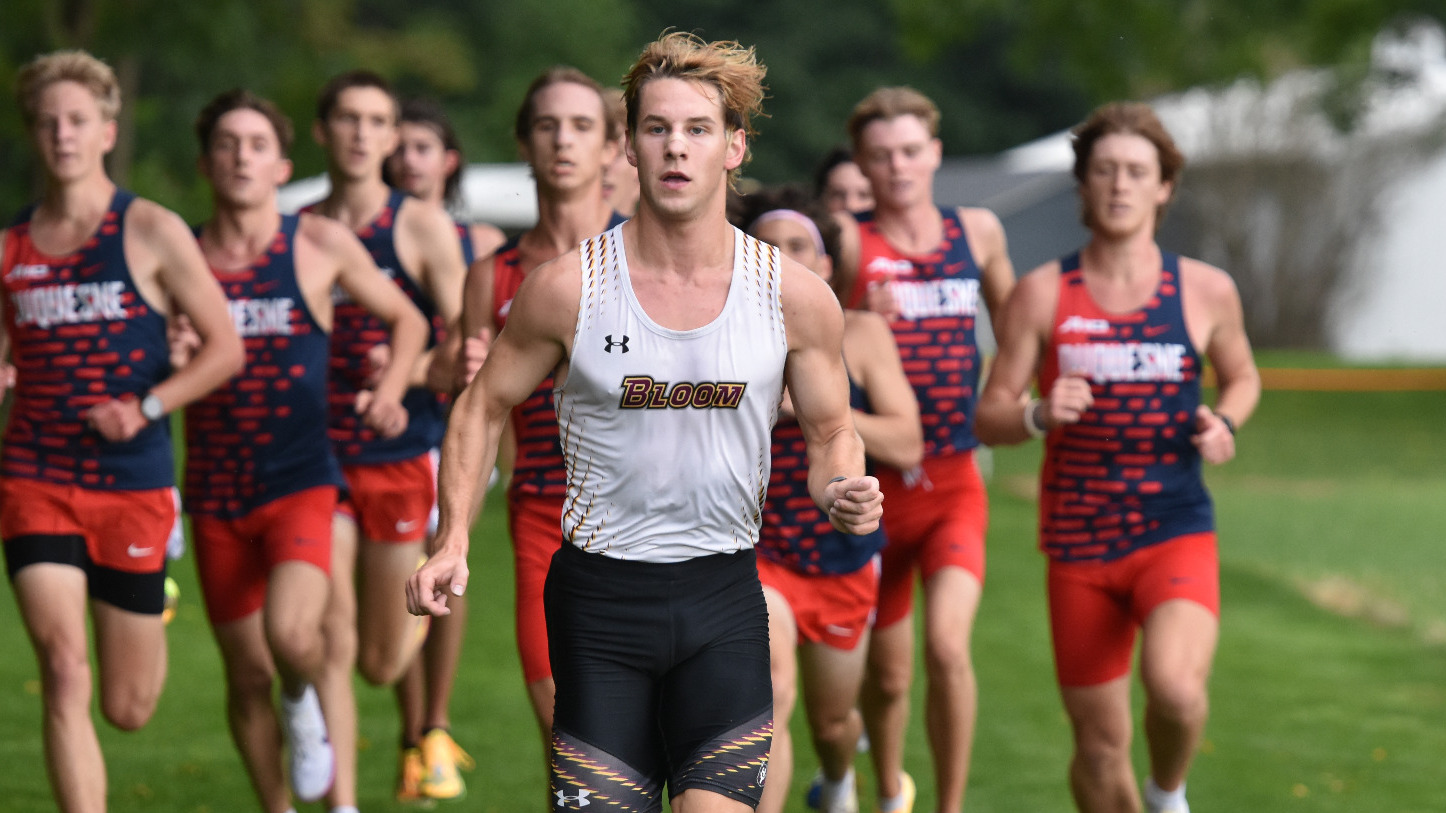 Rex Farr leads a pack of runners at the Father Bede Cross Country meet