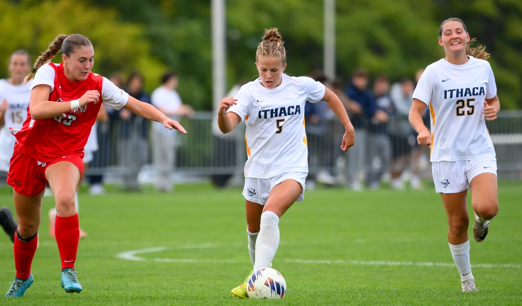 Bogle carries, Medearis behind for support