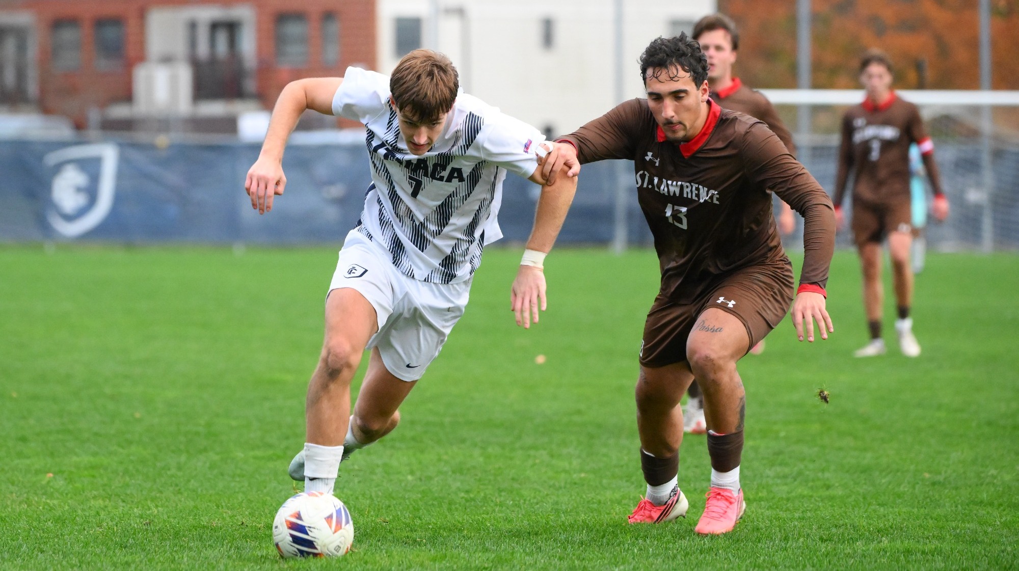 Jack Carney battles SLU defender
