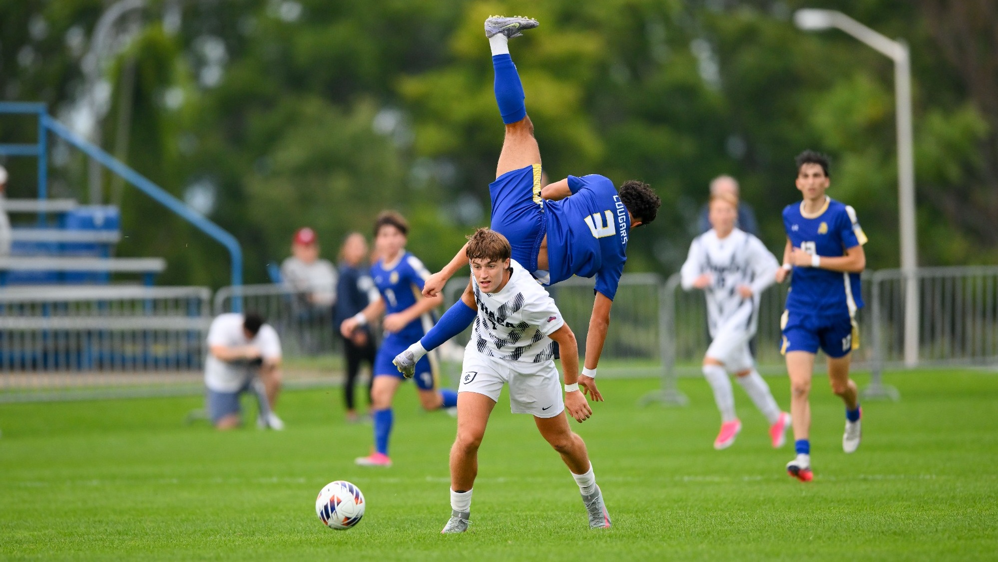 Opponent flips behind Jack Carney