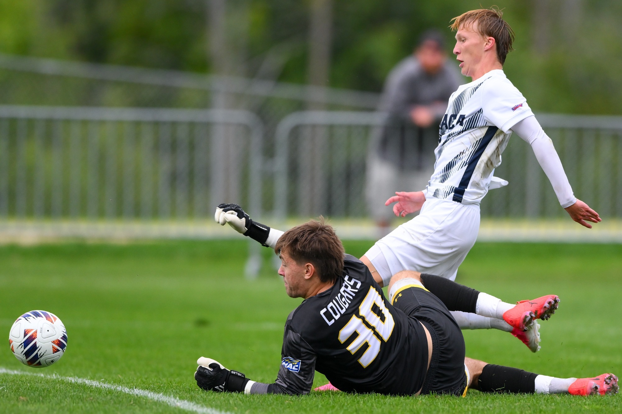 Robinson shoots past goalie on the ground