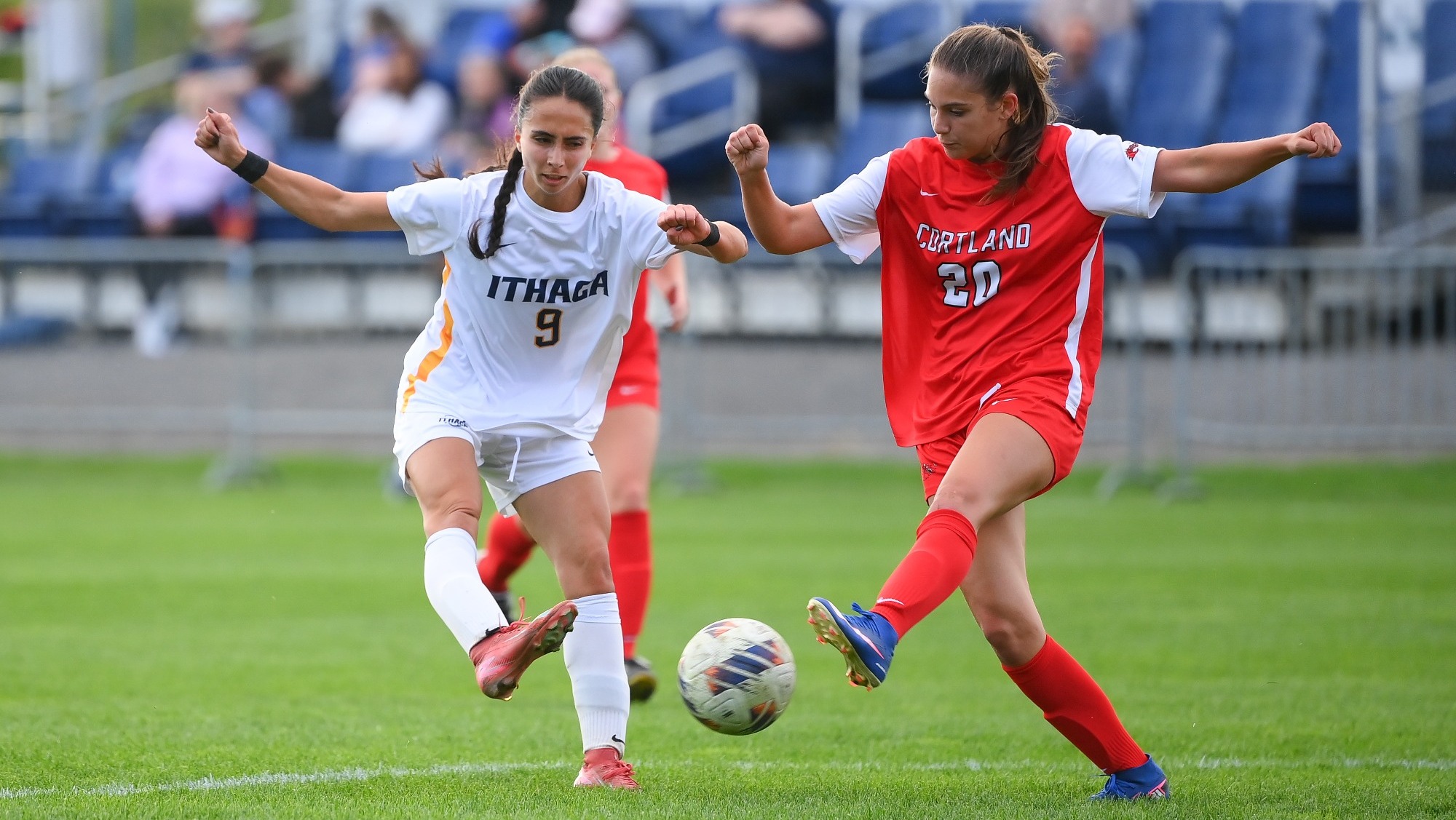 Lilyana Baldi battles for the ball with a Cortland Red Dragon
