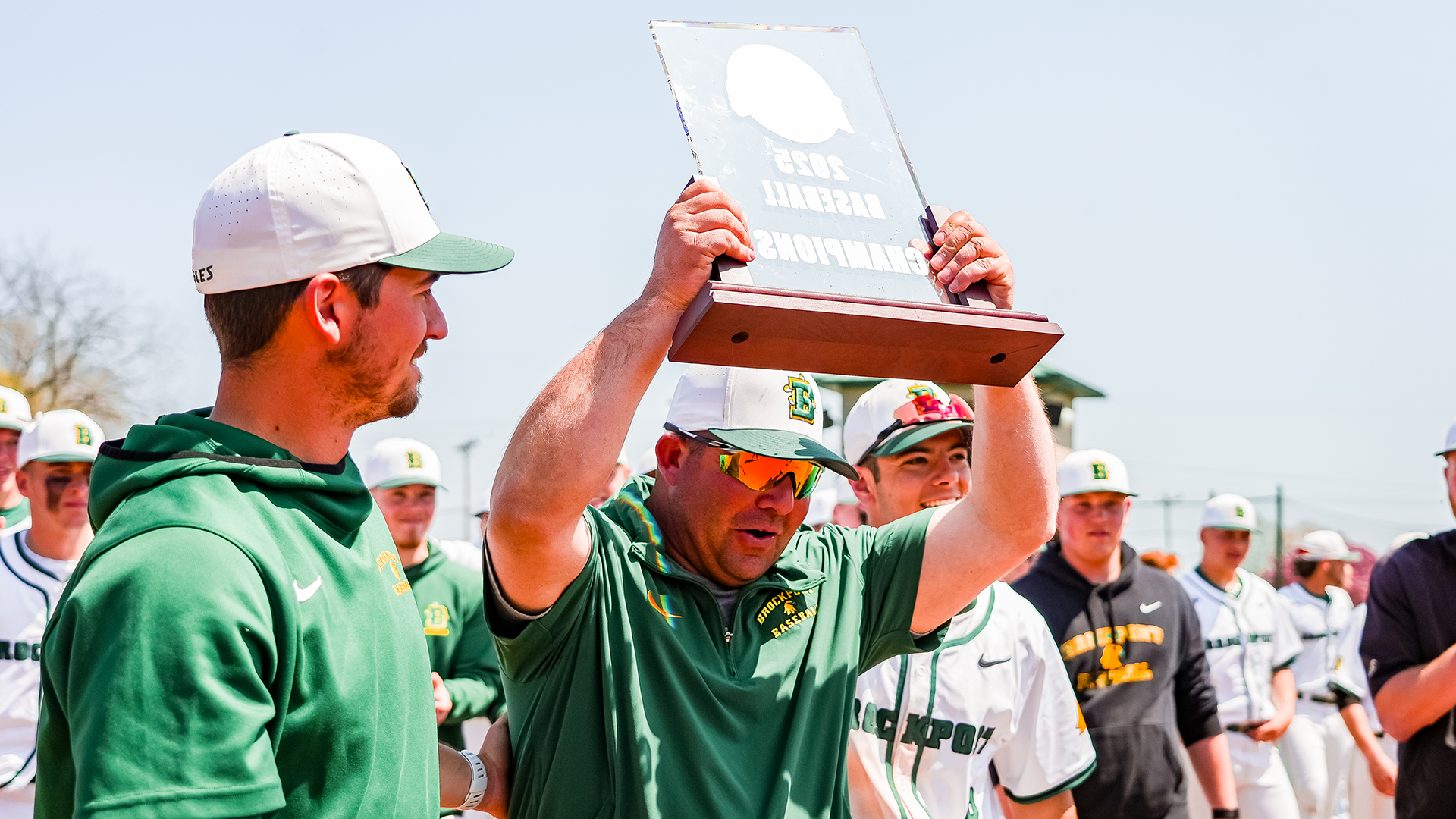 Beach Holding Trophy