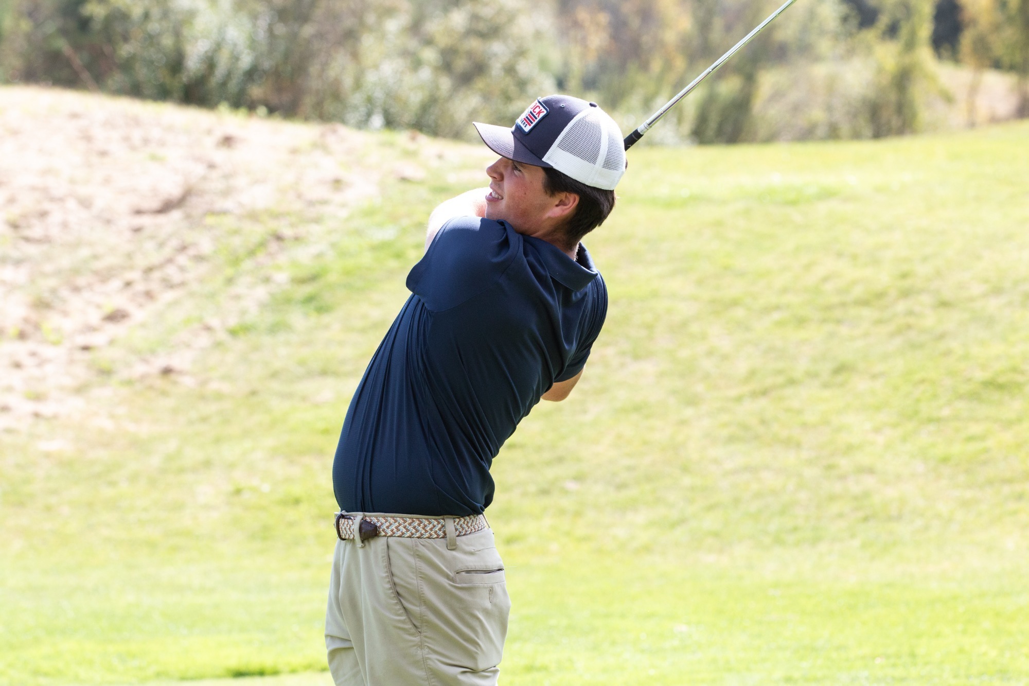 Jaxon Kearns hitting a golf ball