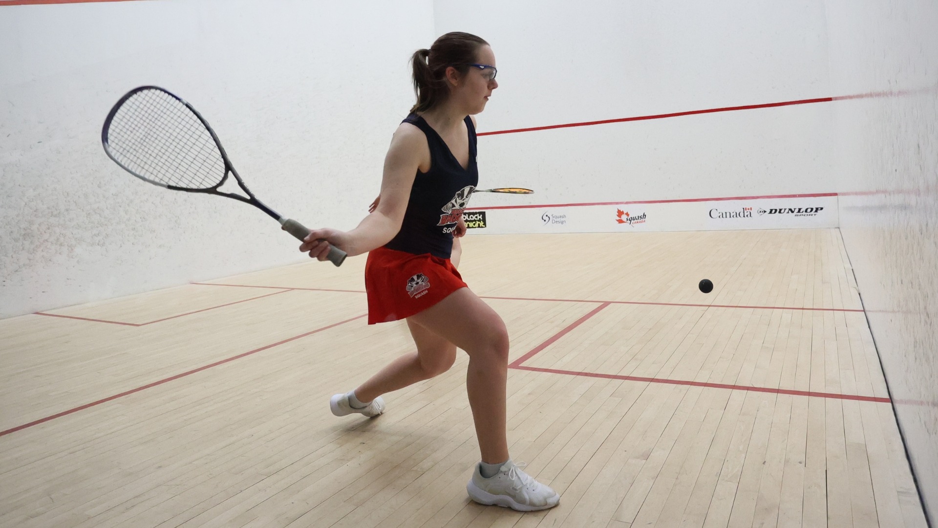 Allison MacPhail hitting the ball.