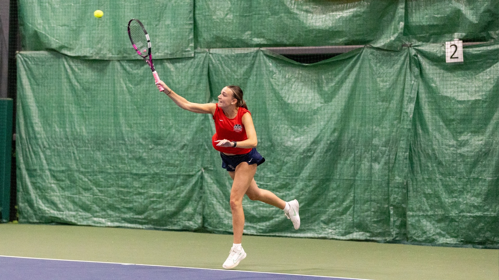 Gabby Cayen hitting the ball