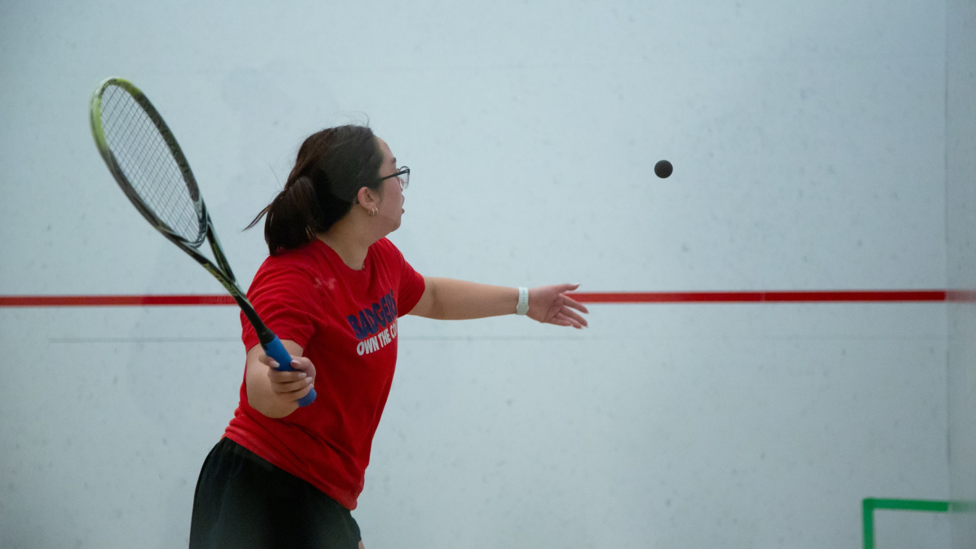 Julie Do squash action shot