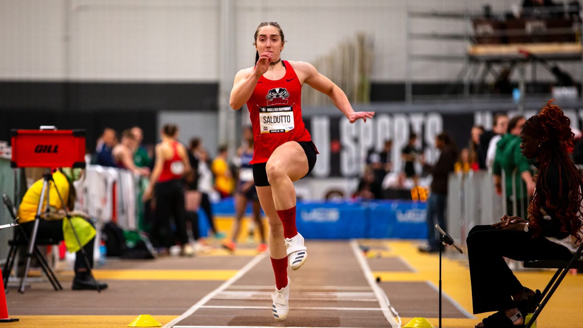 Sarah Saldutto in the midst of a long jump