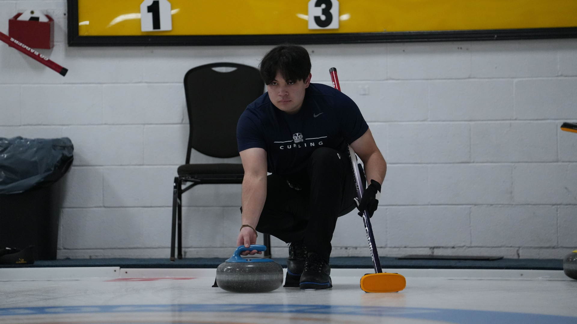 Grayson Lambert preparing to throw a rock