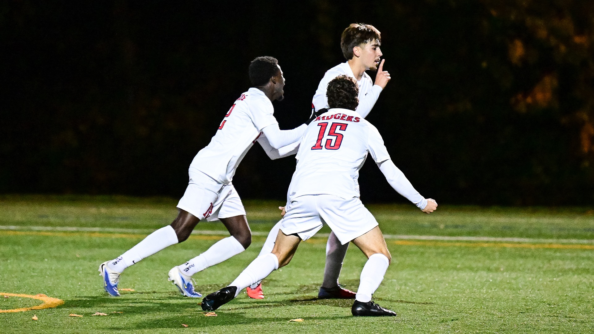 Nathaniel Oliveira hushes the crowd after scoring the game-winning goal in a OUA first round playoff matchup