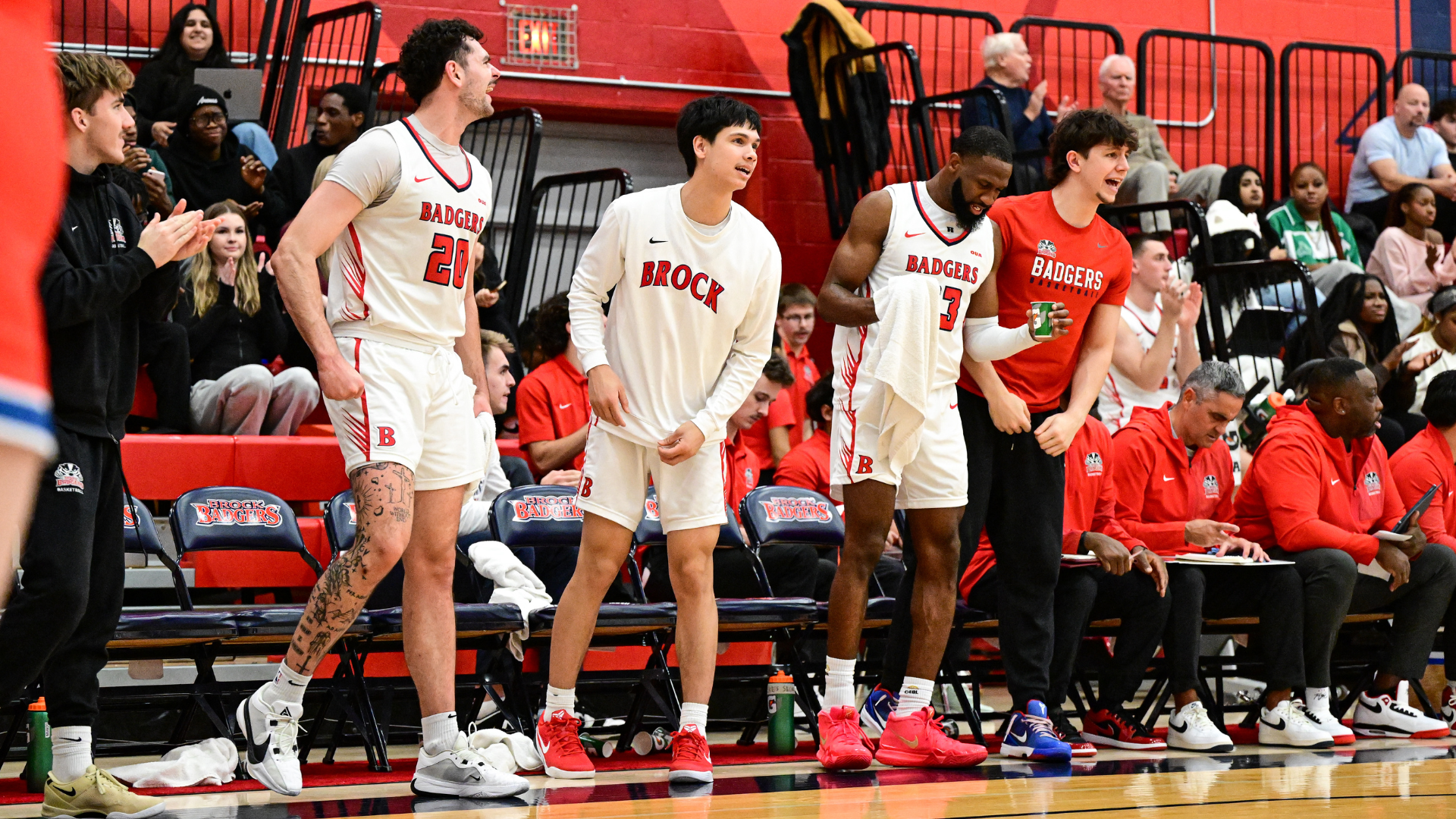 The Brock men's basketball team celebrates a point in OUA action at Bob Davis Gymnasium. 