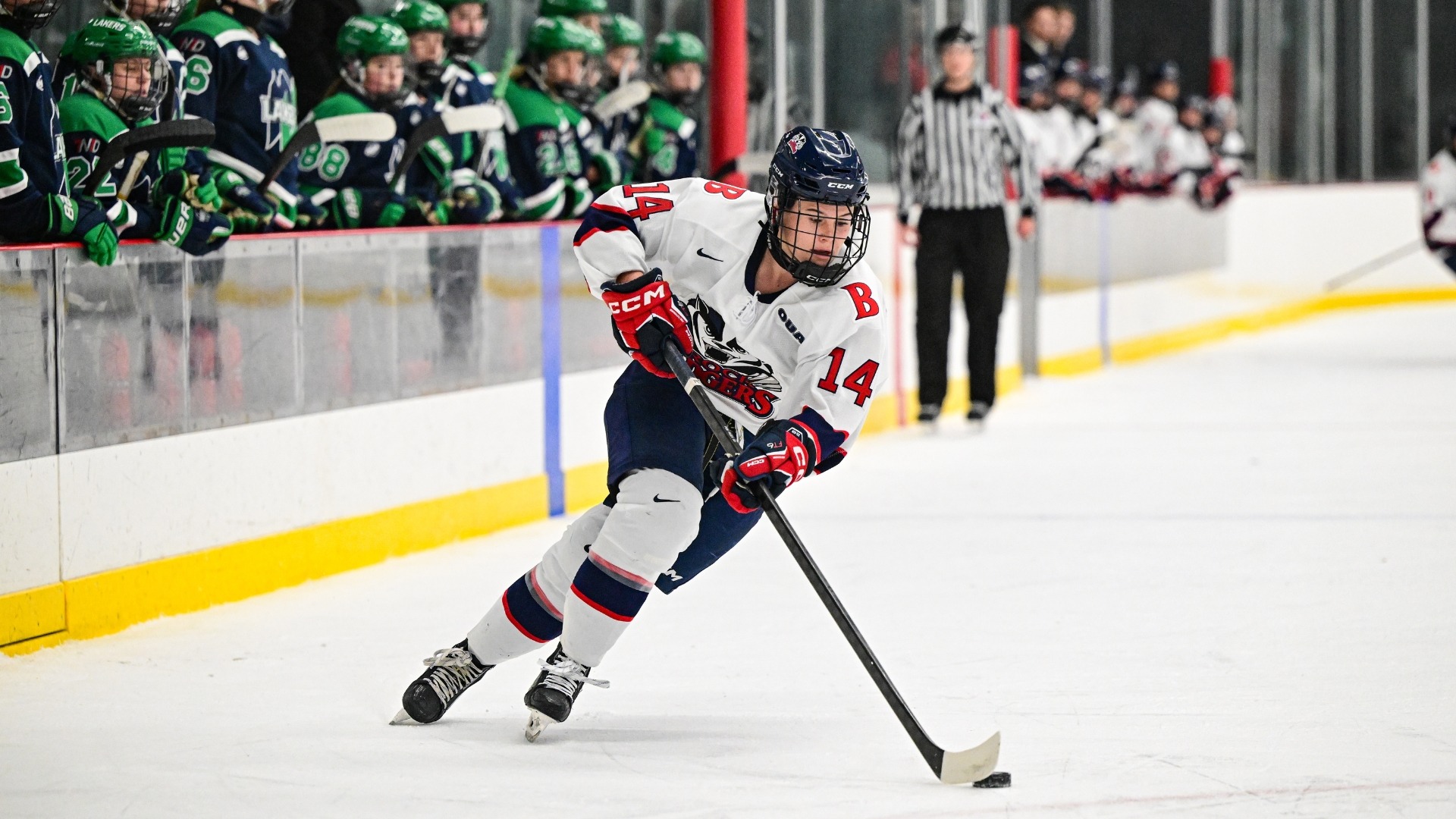 Sydney Hood skating with puck