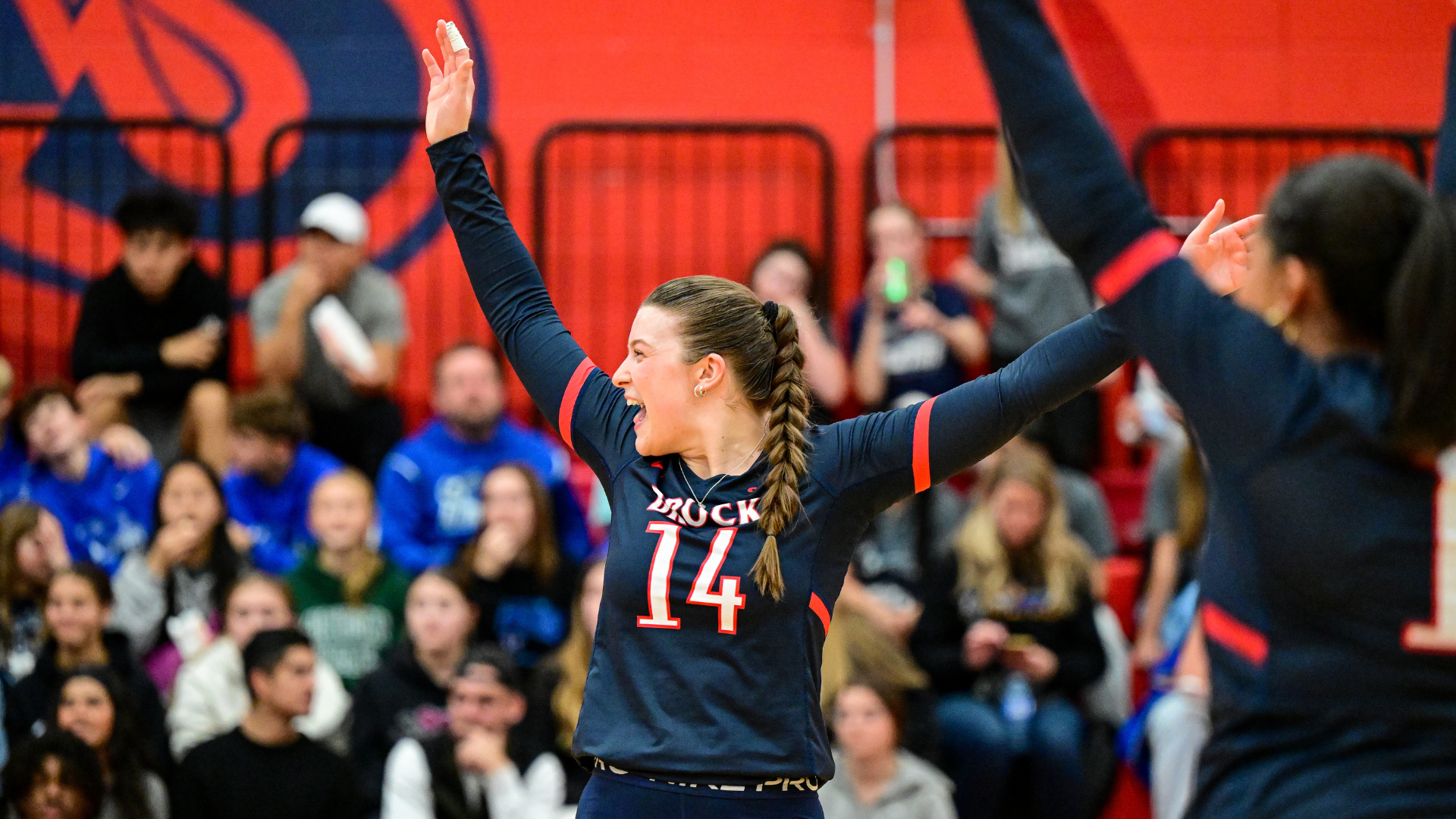 Mackenna Knox, a Brock Badgers women's volleyball player celebrates a point in OUA action