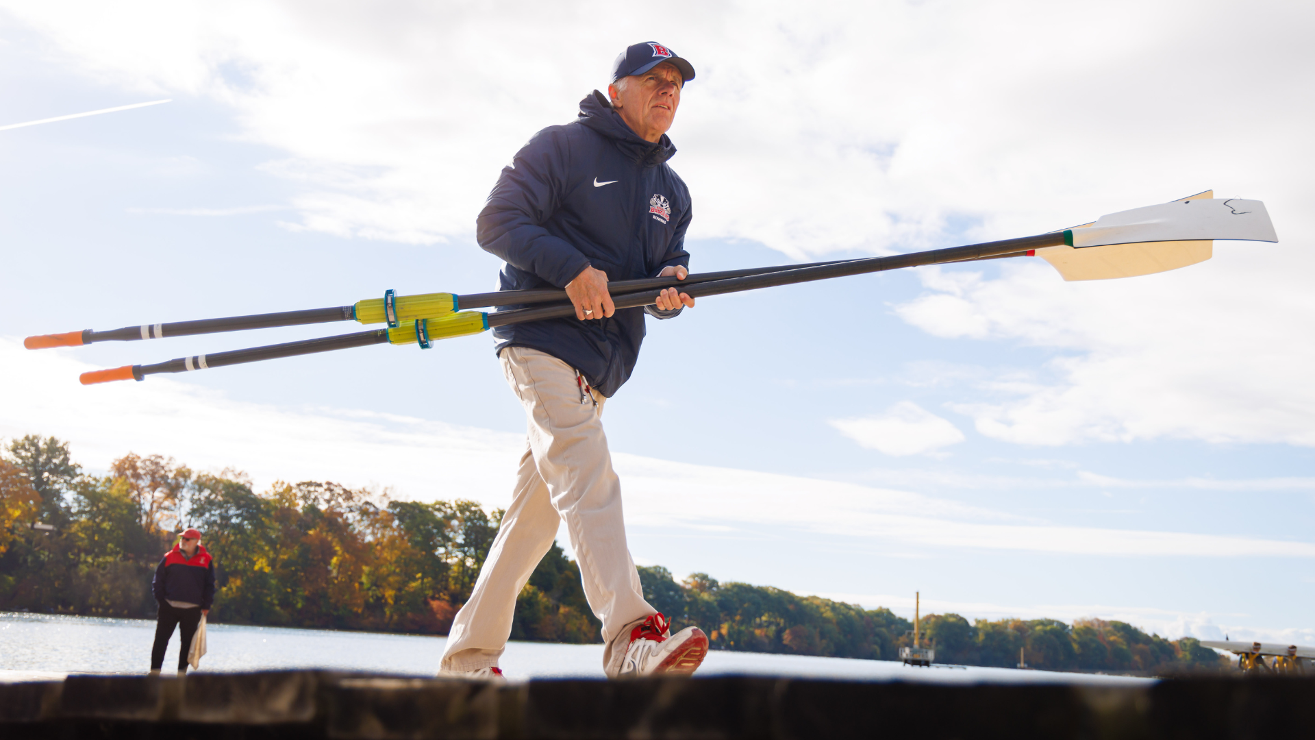 Tom Kent carries some oars at the 2025 OUA Championships