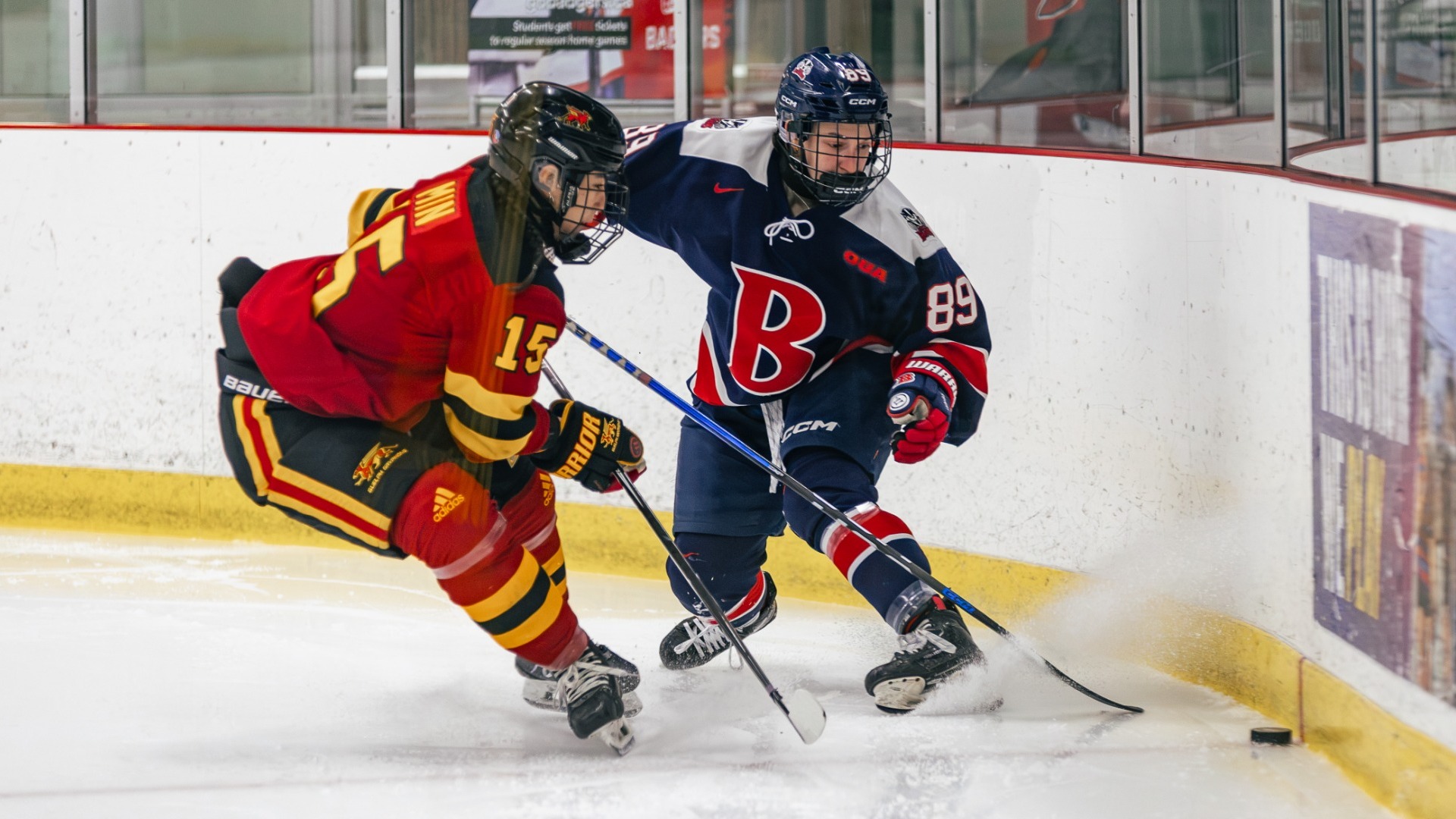 Rachael Burt battles for the puck against a Guelph player
