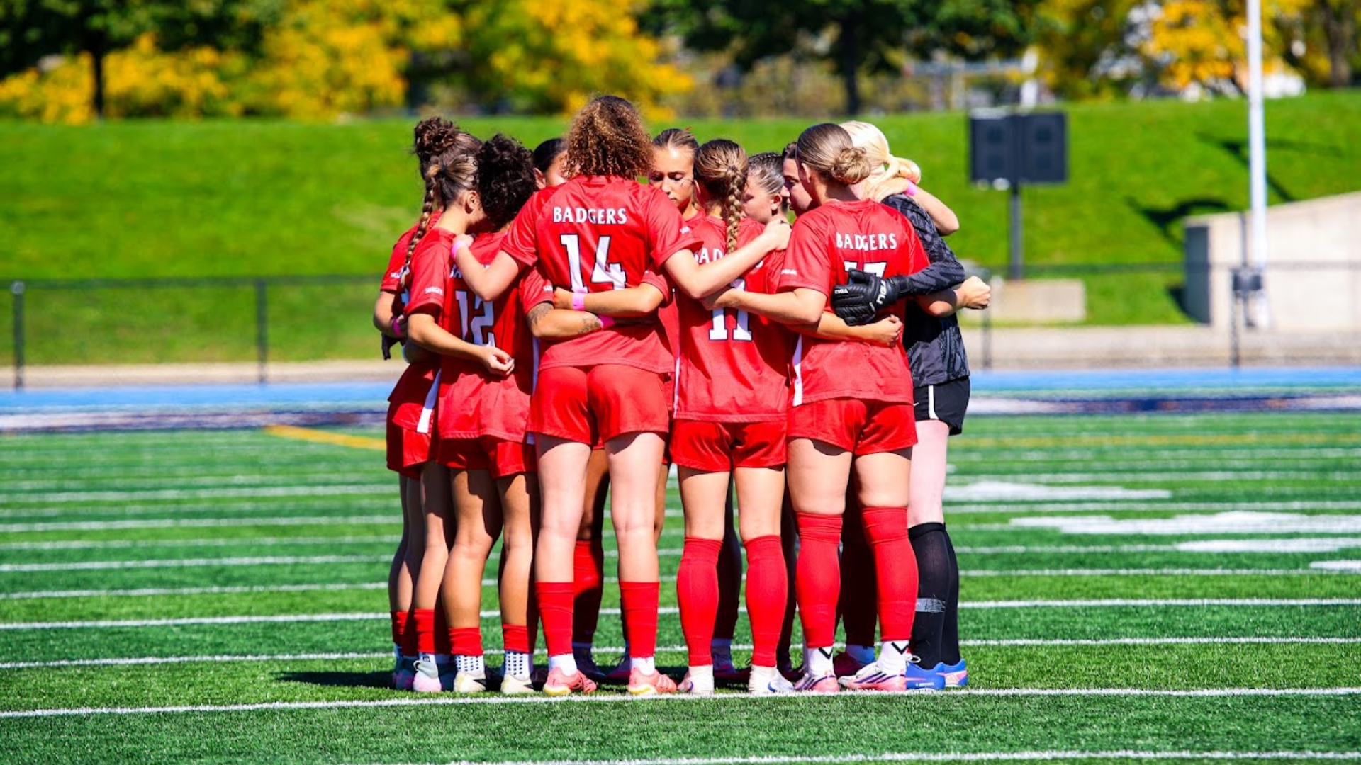 The Brock Badgers women's soccer team huddles before the game begins