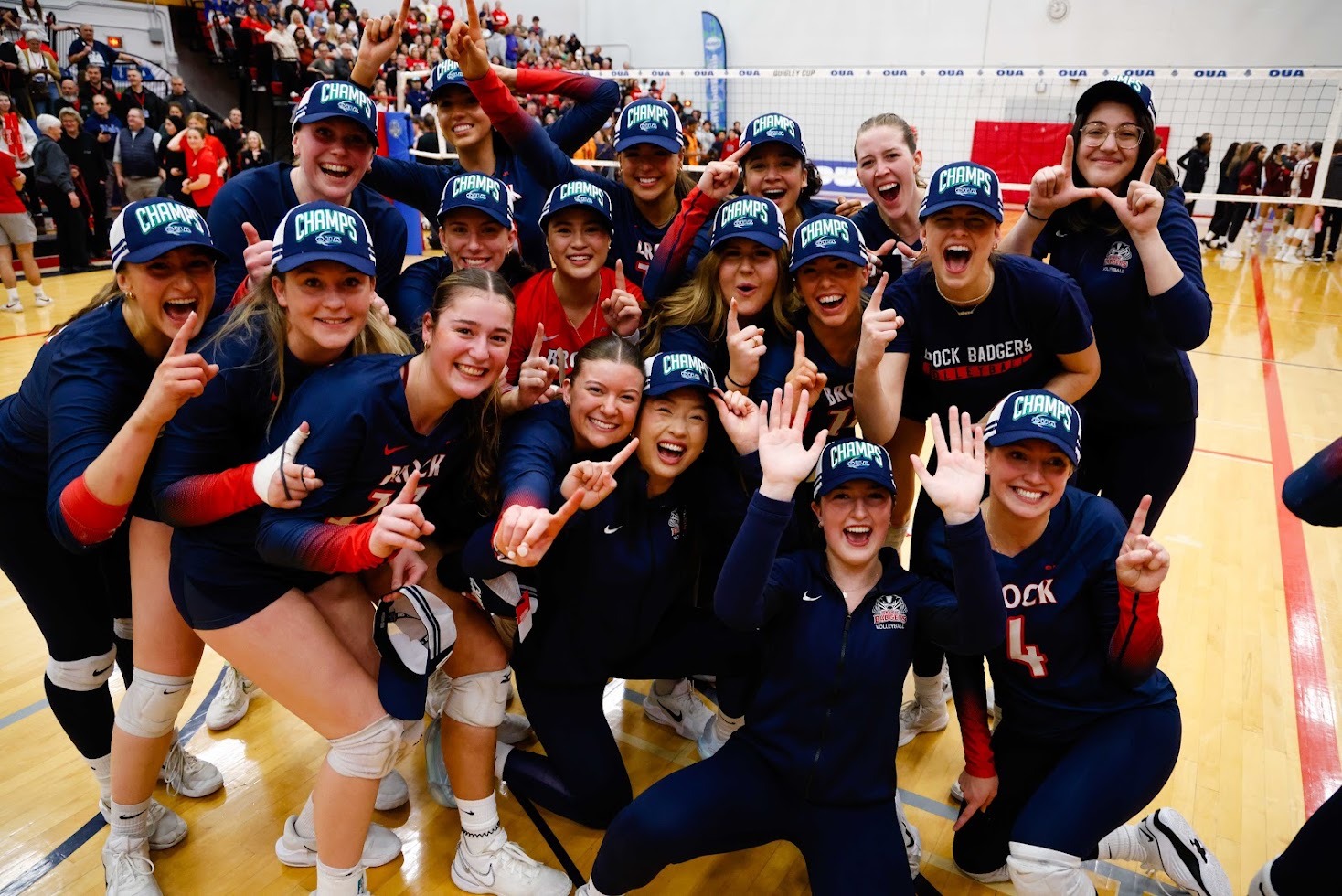 The Brock women's volleyball team celebrates their Quigley Cup championship