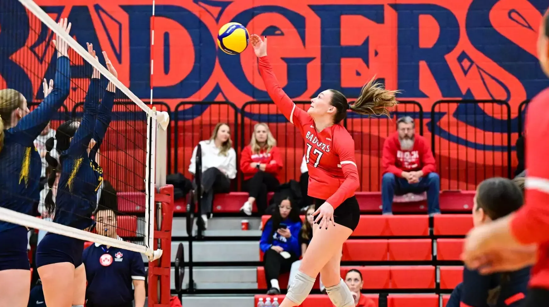 Emma Baruchelli spikes the ball against the Windsor Lancers on Saturday, Feb. 14.
