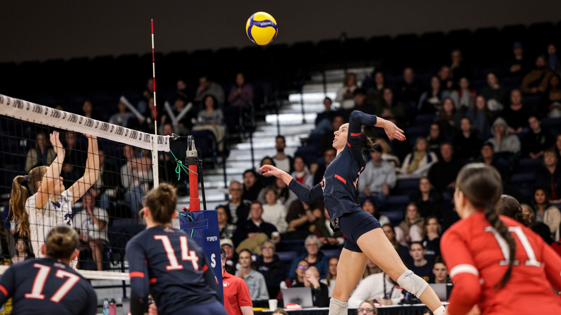 Madison Tuck hits the ball against the Trinity Western Spartans at the 2026 U SPORTS Championship.