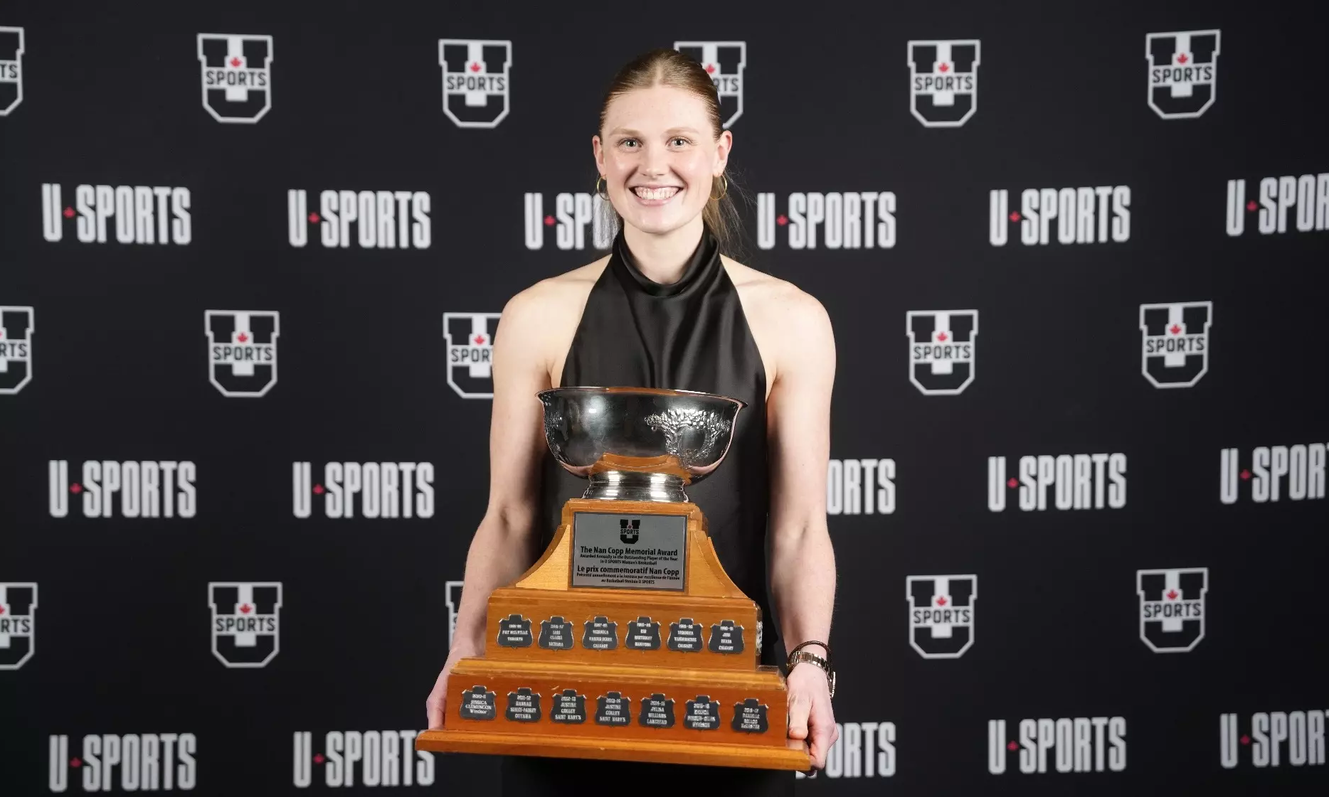 Madalyn Weinert with the trophy