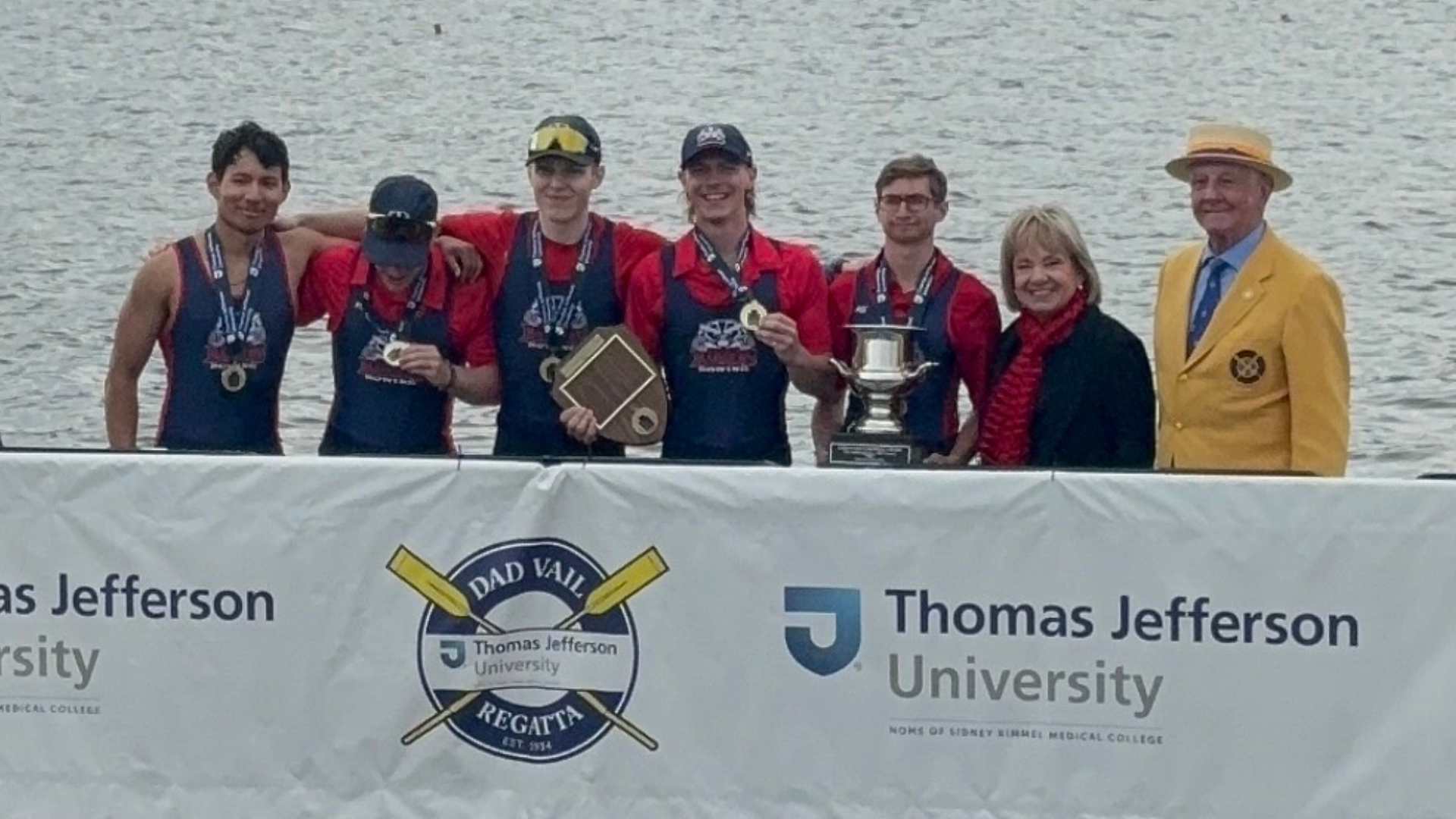 Dad vails picture featuring five Brock rowers