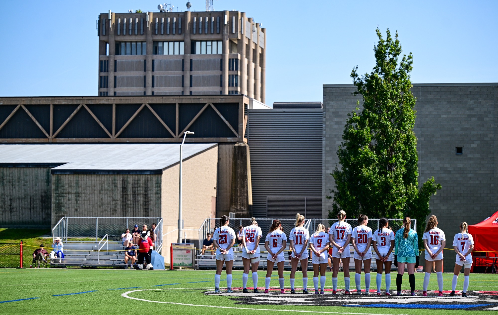 Women's soccer players lined up before a game