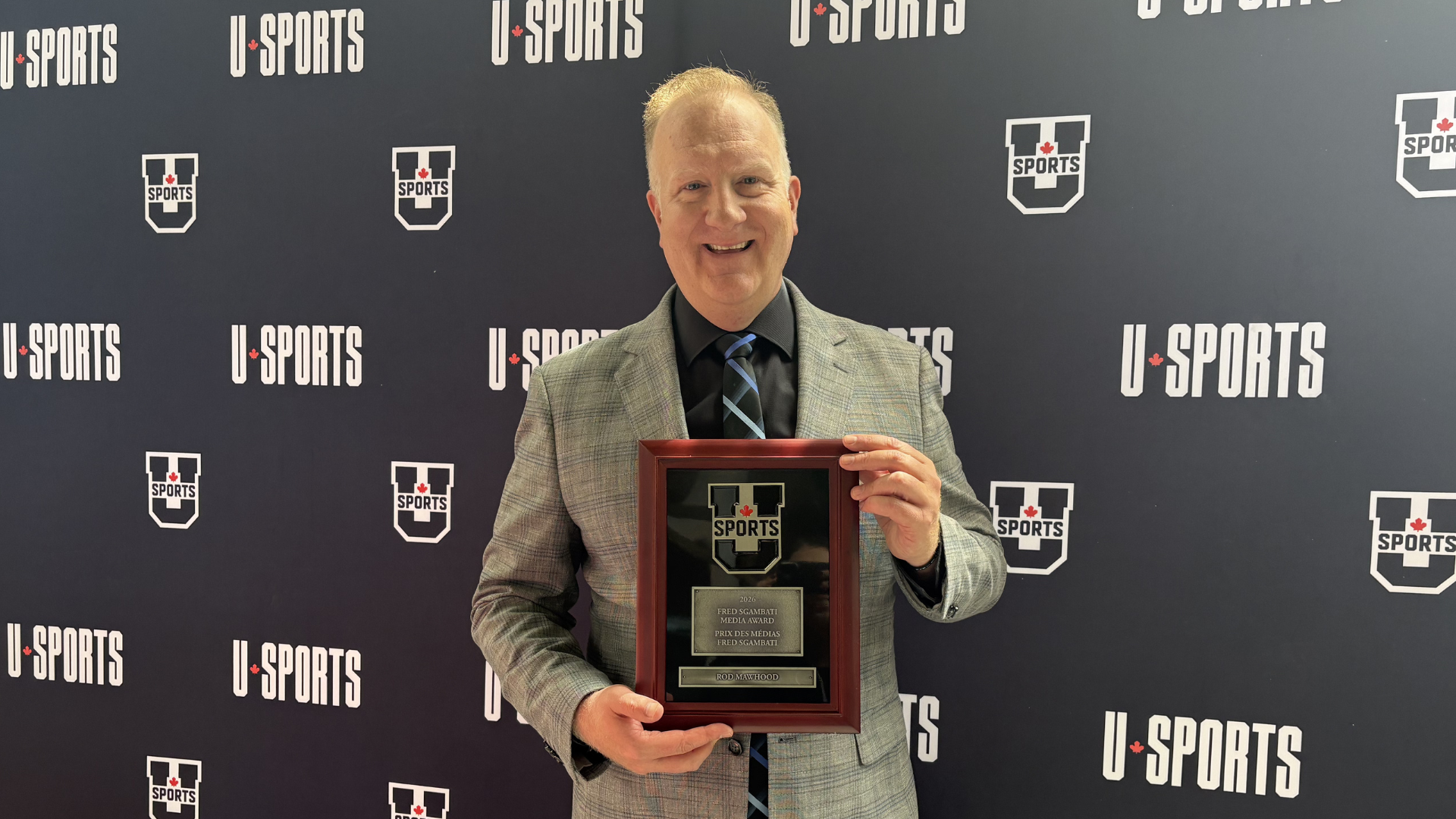 Rod Mawhood with award