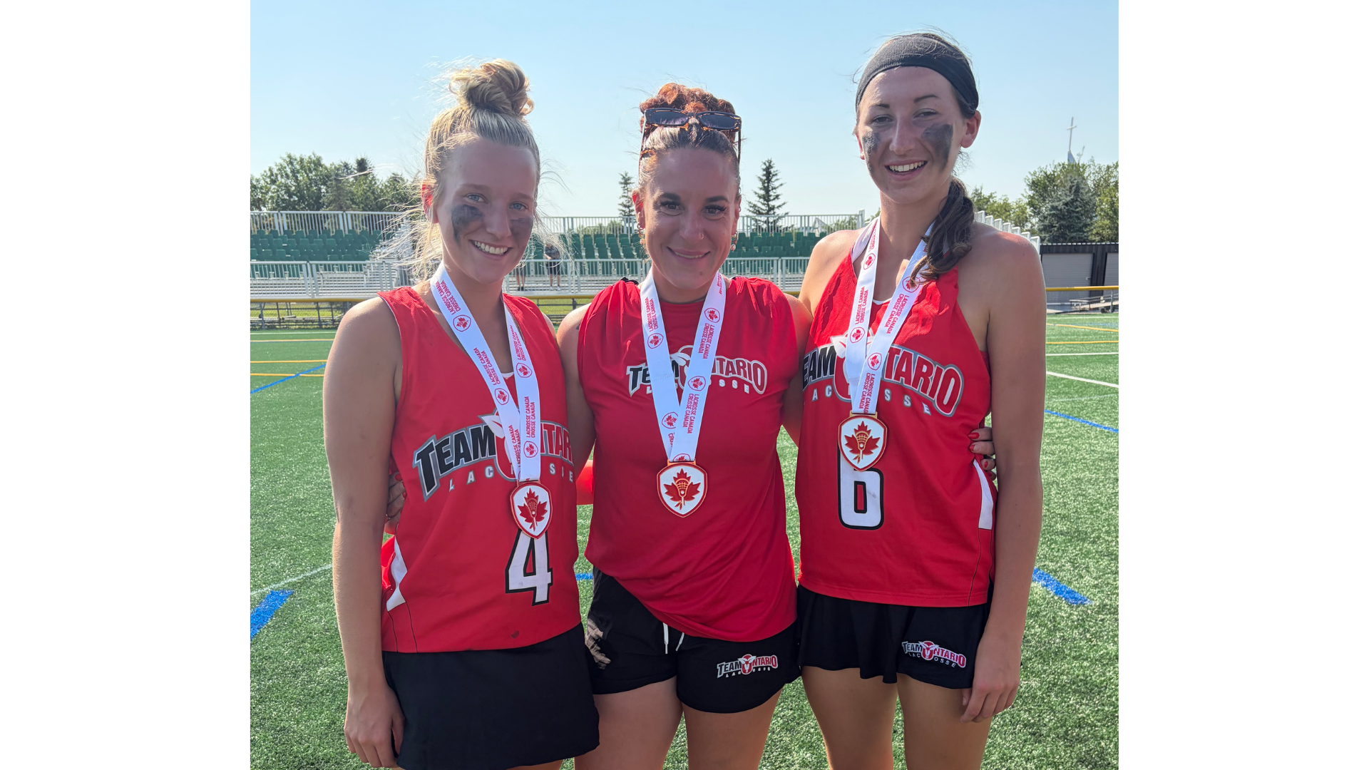 Laura Tober pictured with incoming Badgers Allie Arnott and Hailey Fennema