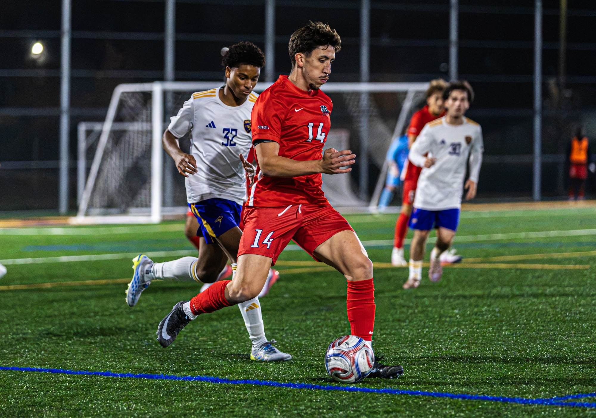Soccer player running with ball