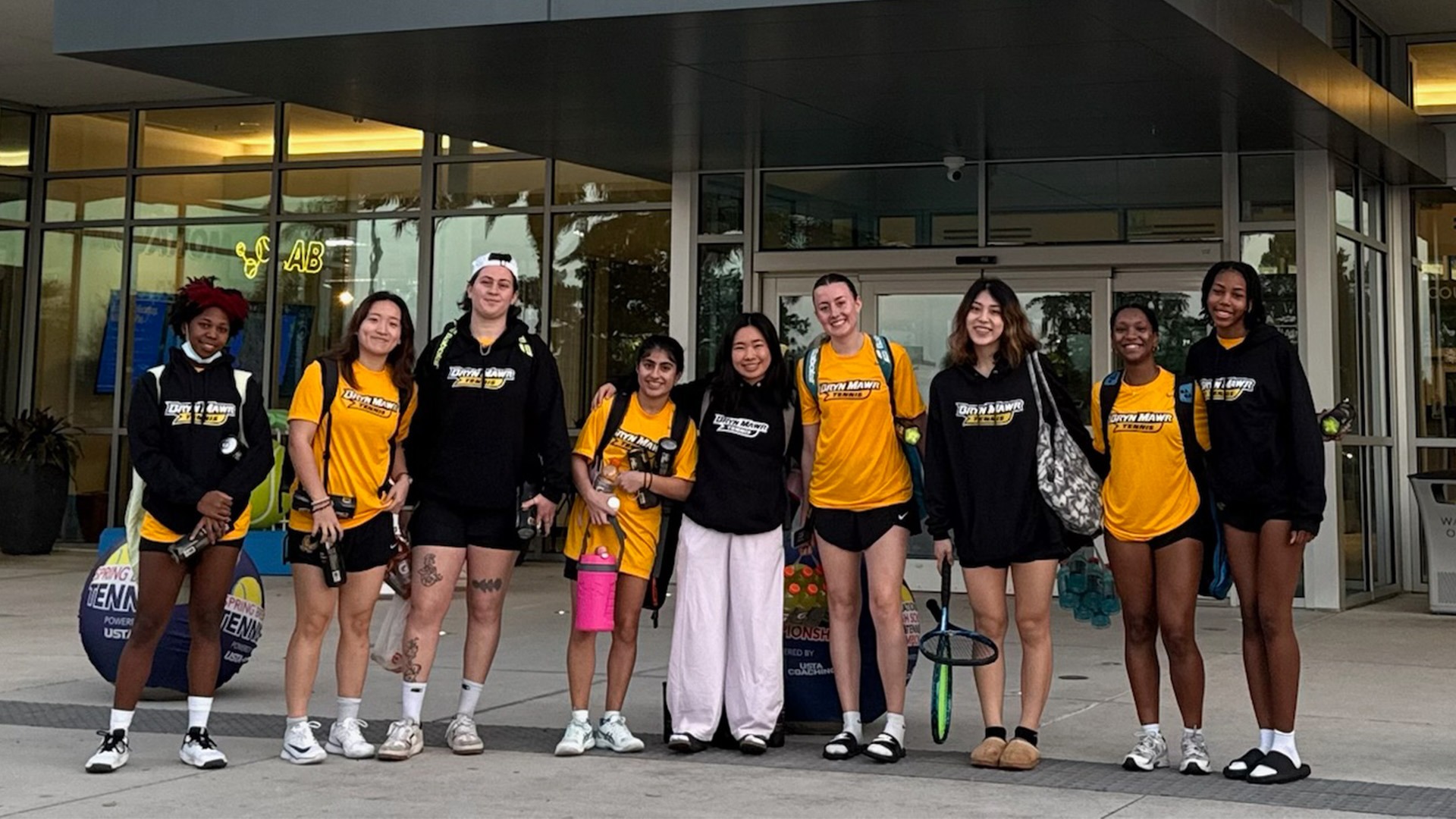 Tennis Team Photo in front of USTA Welcome Center